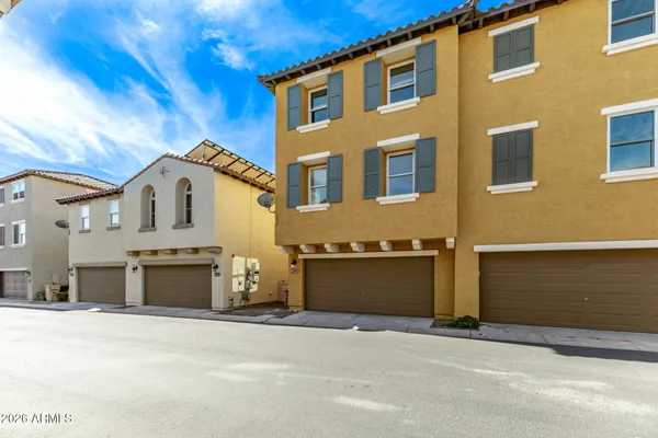 a view of a building with a garage