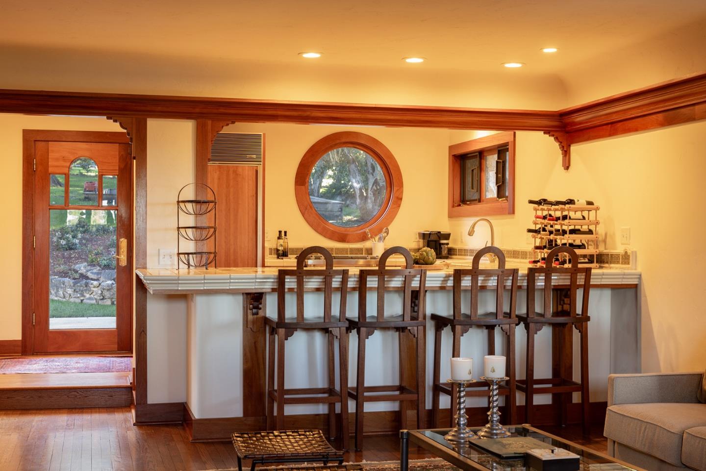 72 Fern Canyon Road Carmel, CA 93923 - Photo 42 of 66 a group of chairs sitting in a kitchen next to a window