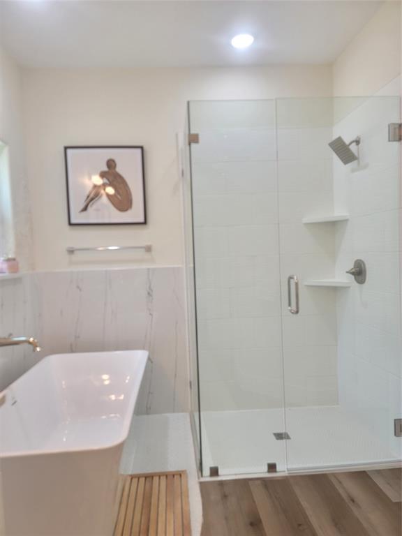 4825 Wichita Street Granbury, TX 76048 - Photo 22 of 30 a bathroom with a bathtub and shower