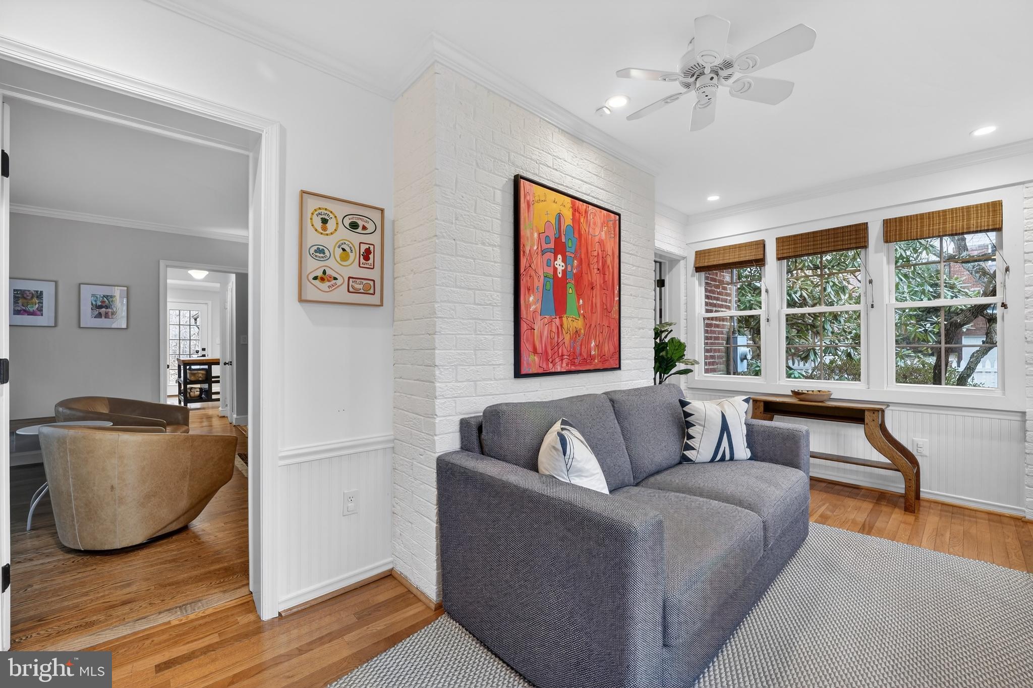 5445 30th Street Northwest Washington, DC 20015 - Photo 11 of 46 a living room with furniture and a large window
