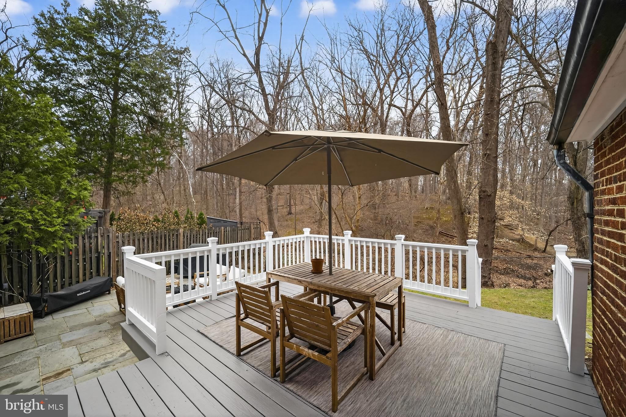5445 30th Street Northwest Washington, DC 20015 - Photo 19 of 46 a view of a wooden deck with furniture