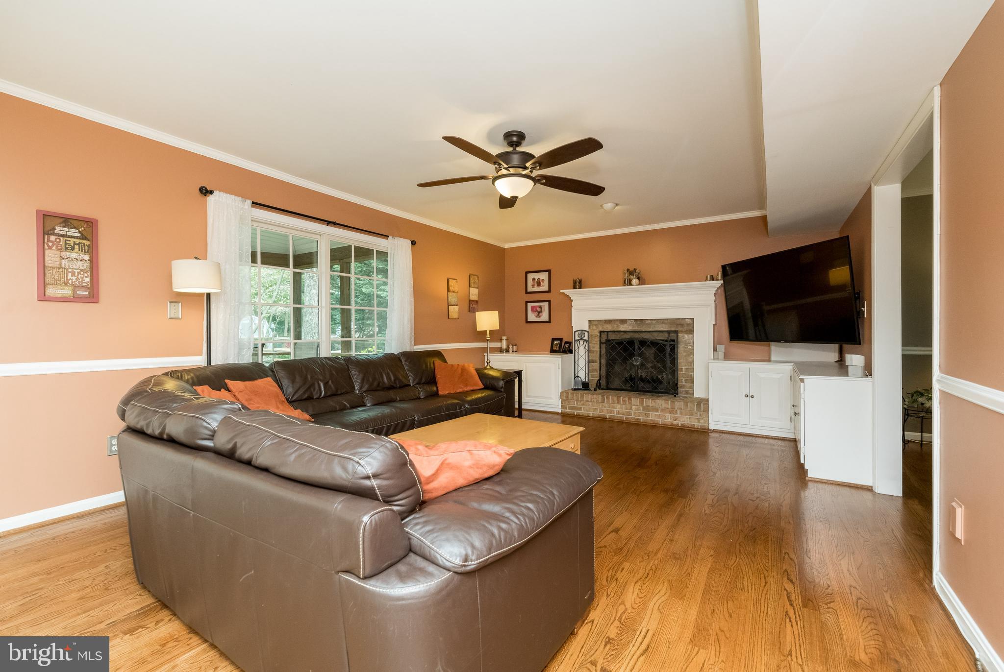 1007 Valewood Road Towson, MD 21286 - Photo 15 of 49 a living room with furniture fireplace and flat screen tv