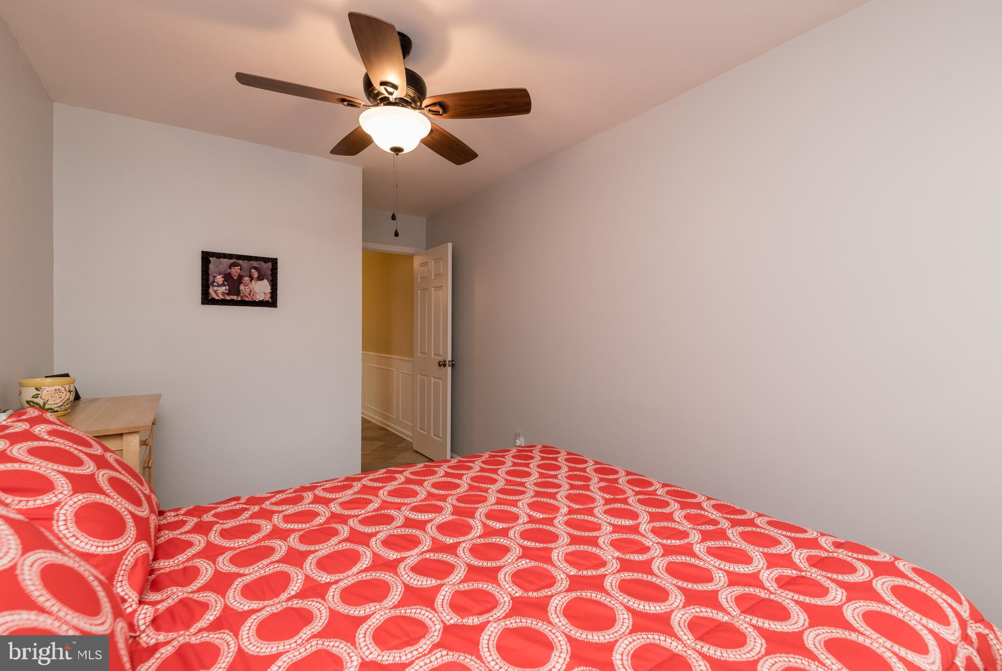 1007 Valewood Road Towson, MD 21286 - Photo 19 of 49 a bedroom with a bed and a dresser