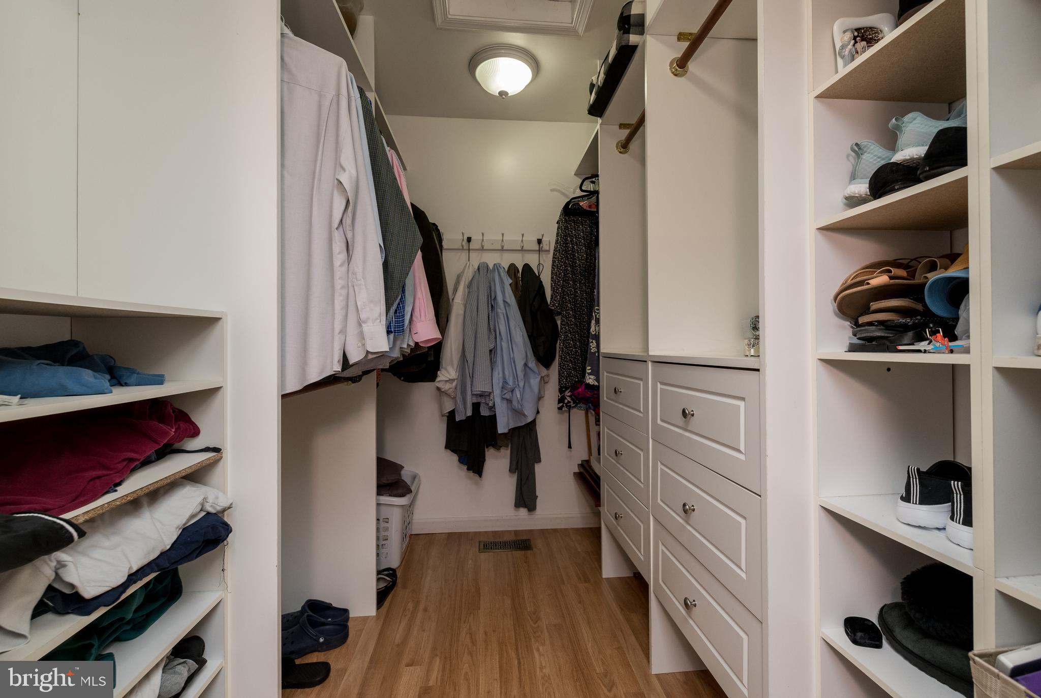 1007 Valewood Road Towson, MD 21286 - Photo 23 of 49 a view of walk in closet with clothes and shoes