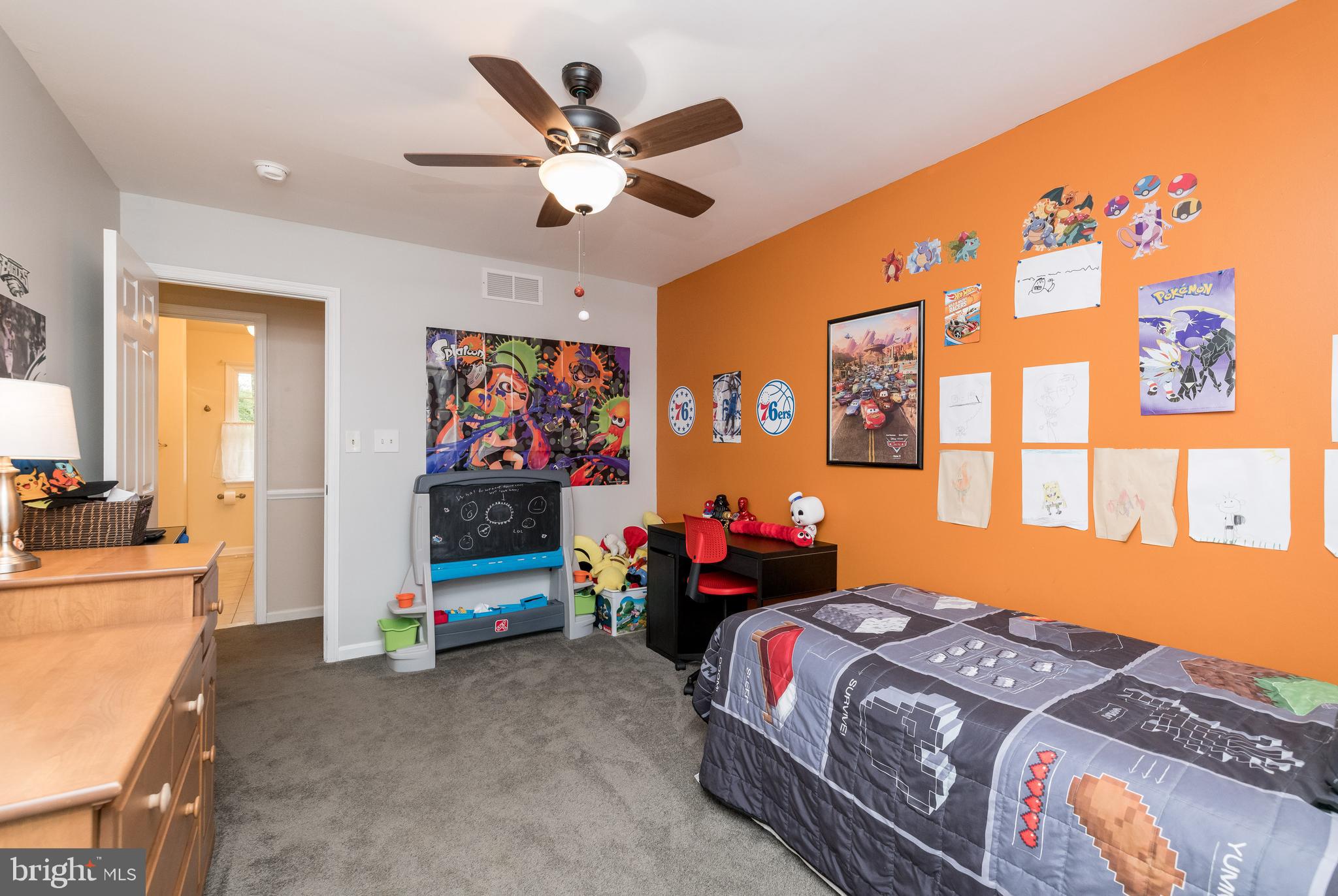 1007 Valewood Road Towson, MD 21286 - Photo 34 of 49 a bedroom with a bed and a chandelier