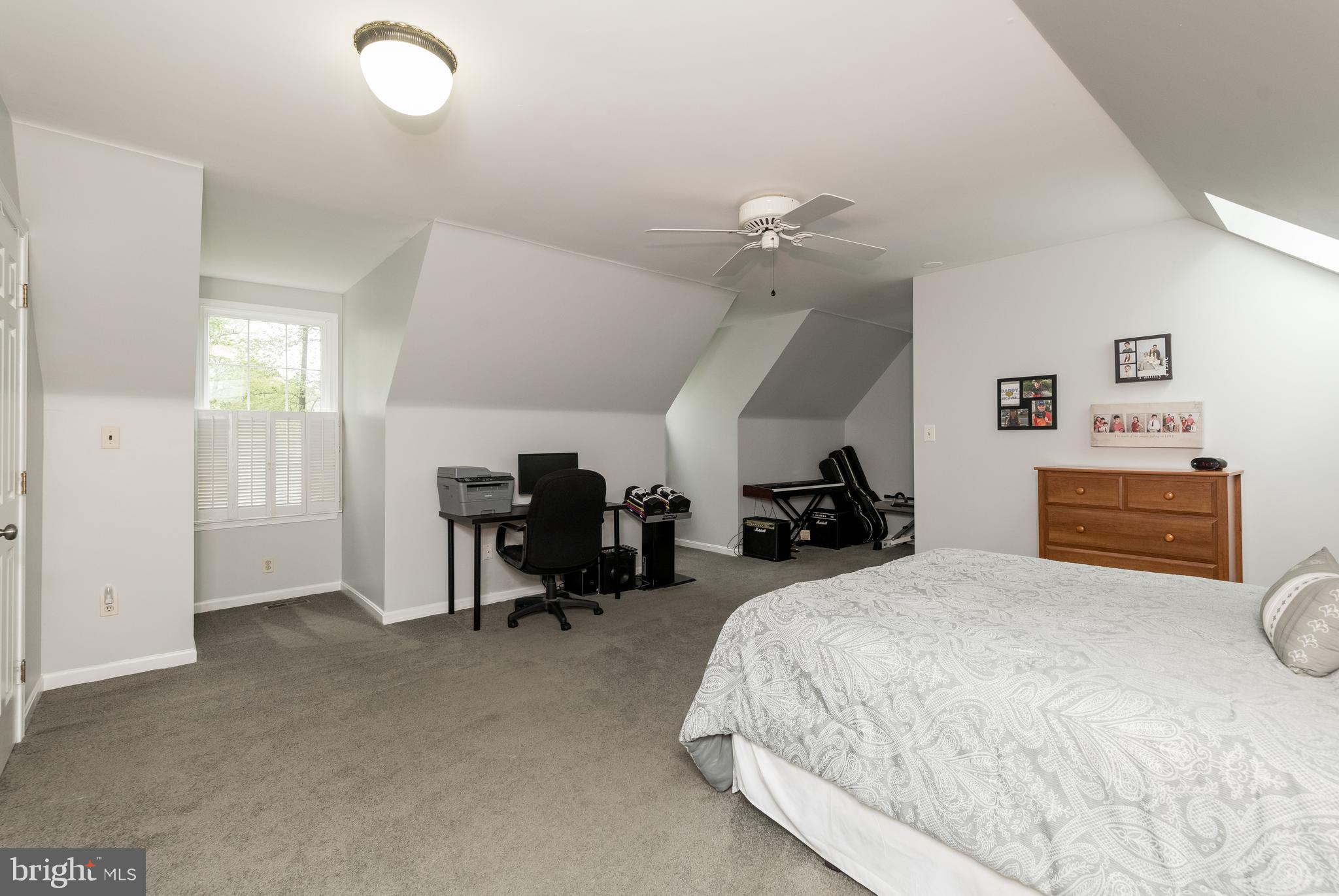 1007 Valewood Road Towson, MD 21286 - Photo 35 of 49 a bed room with a bed and furniture