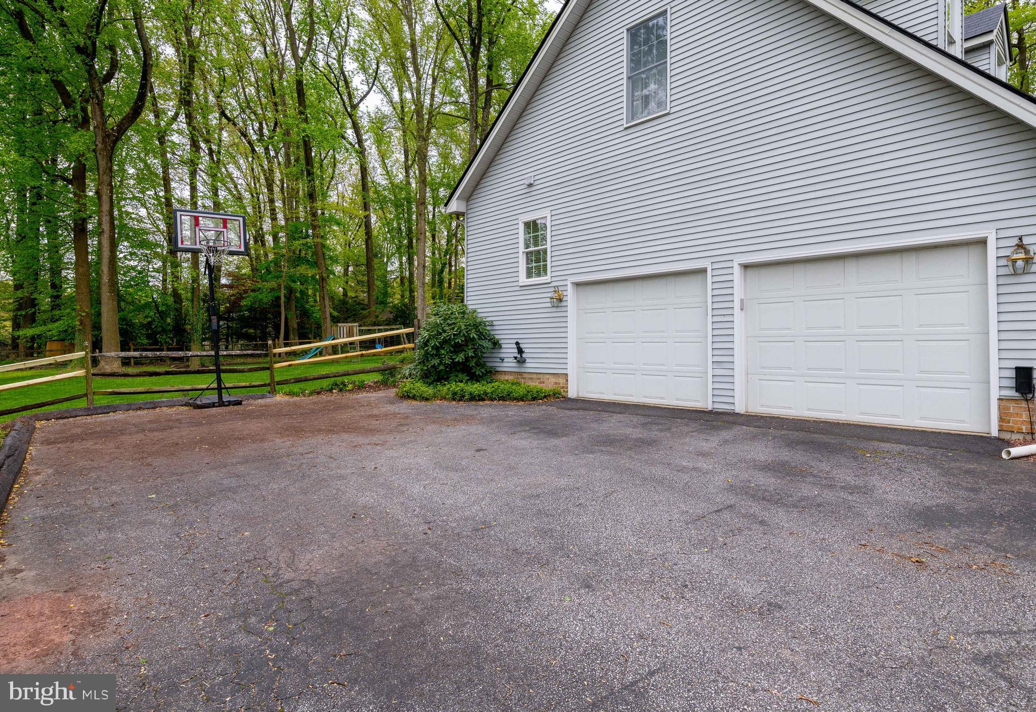 1007 Valewood Road Towson, MD 21286 - Photo 45 of 49 a view of a house with a backyard and trees