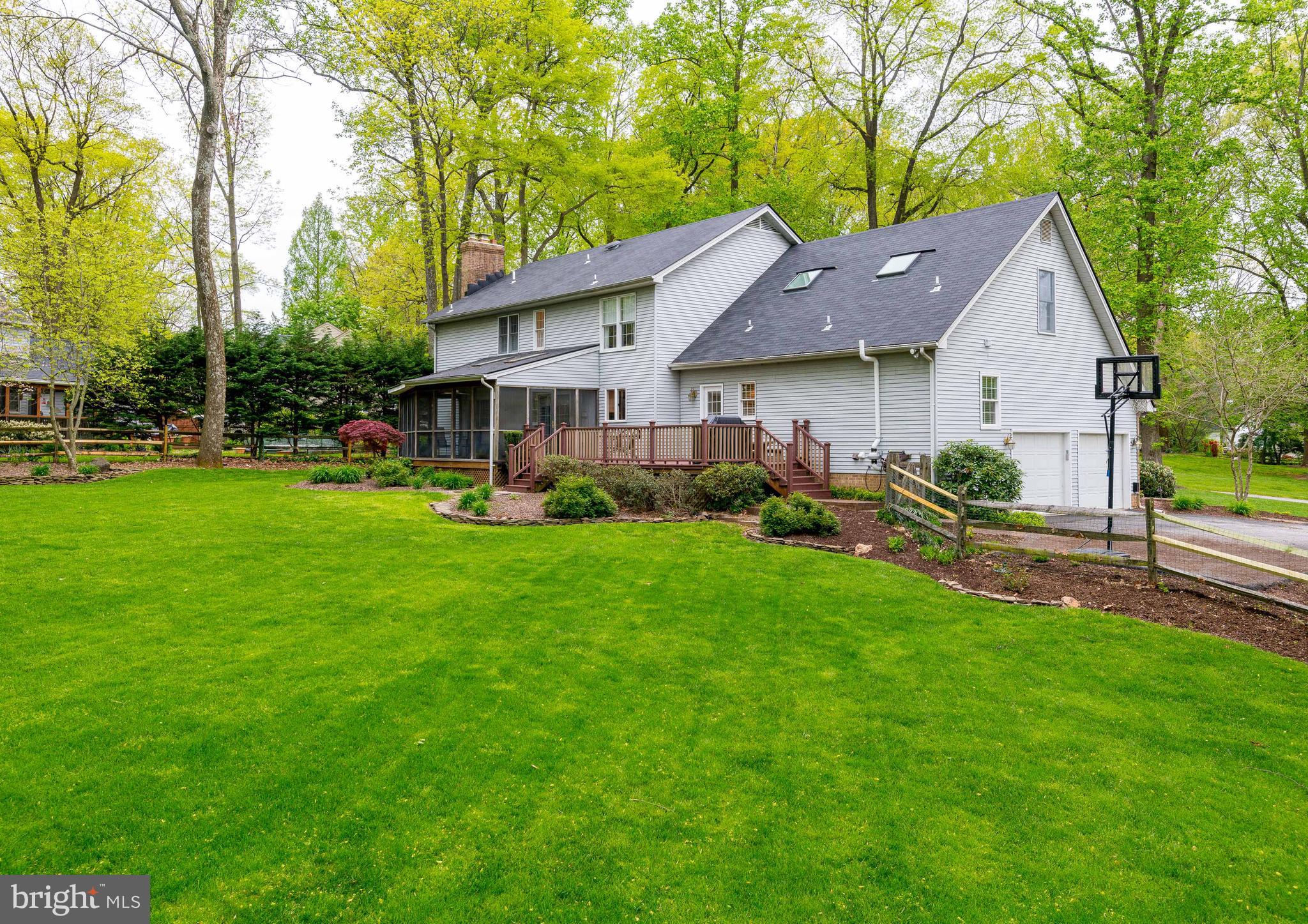 1007 Valewood Road Towson, MD 21286 - Photo 49 of 49 a aerial view of a house with a yard potted plants and a large tree