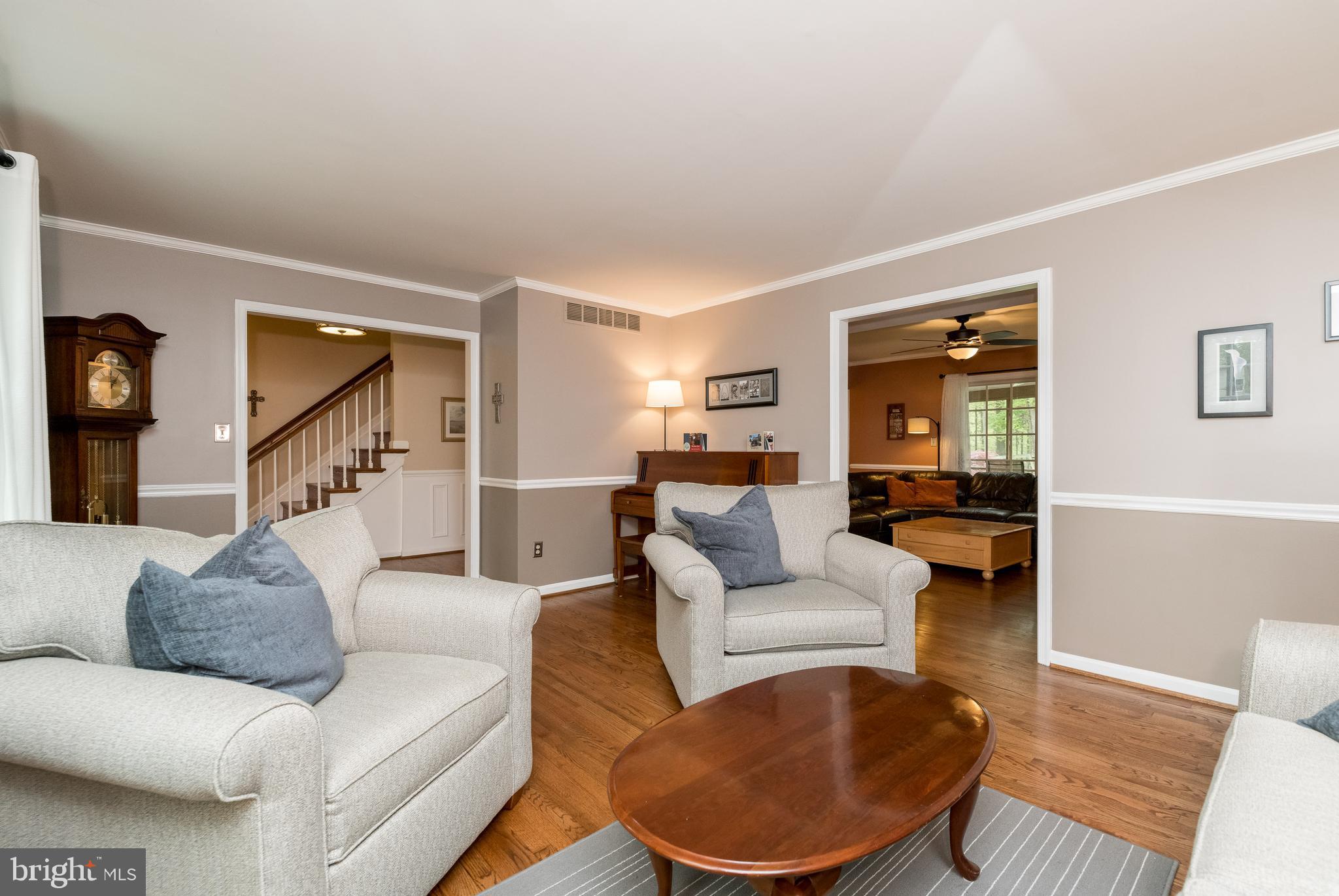 1007 Valewood Road Towson, MD 21286 - Photo 7 of 49 a living room with furniture and a wooden floor