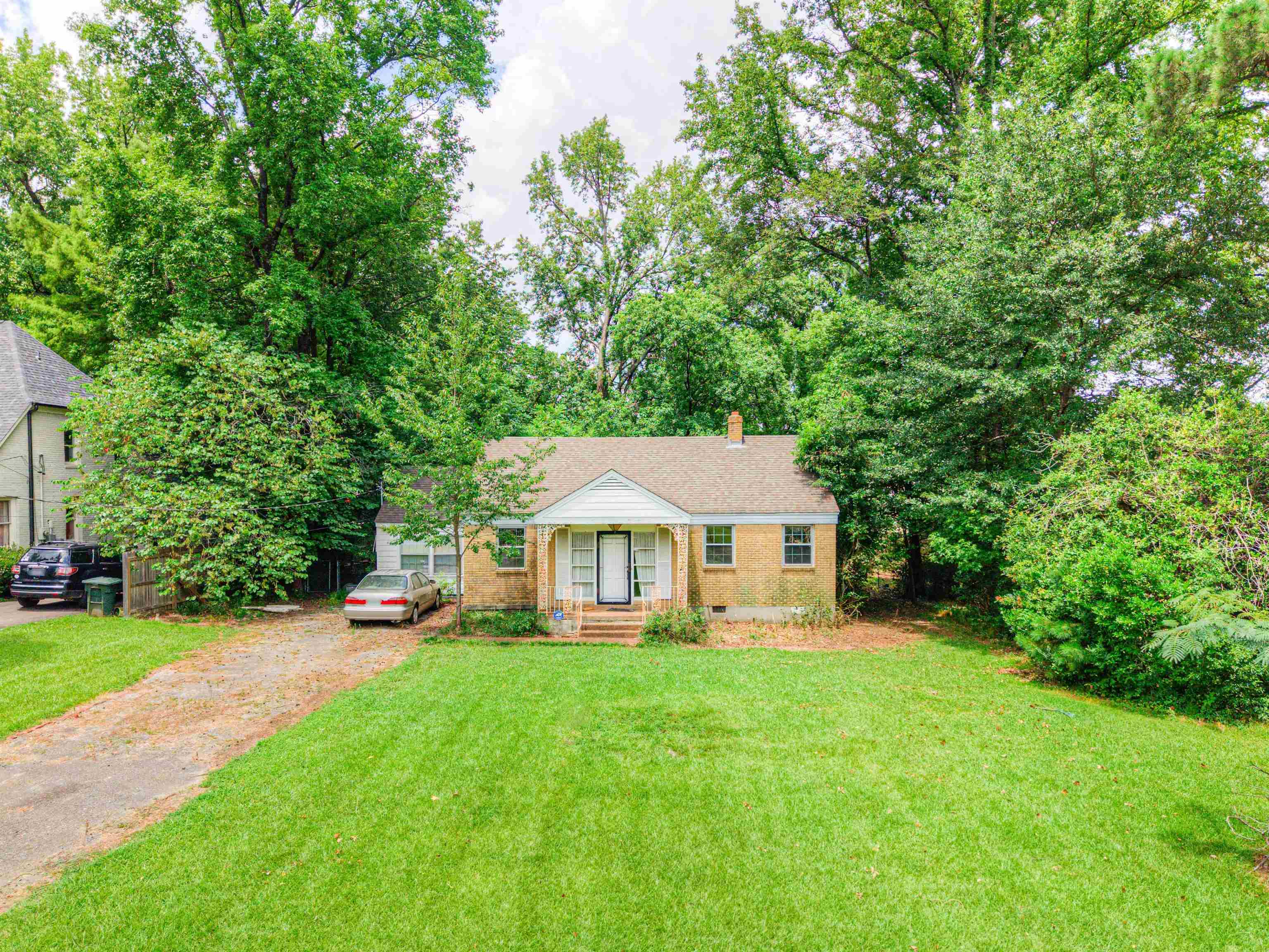 4972 Minden Road Memphis, TN 38117 - Photo 2 of 15 a view of house that has a yard