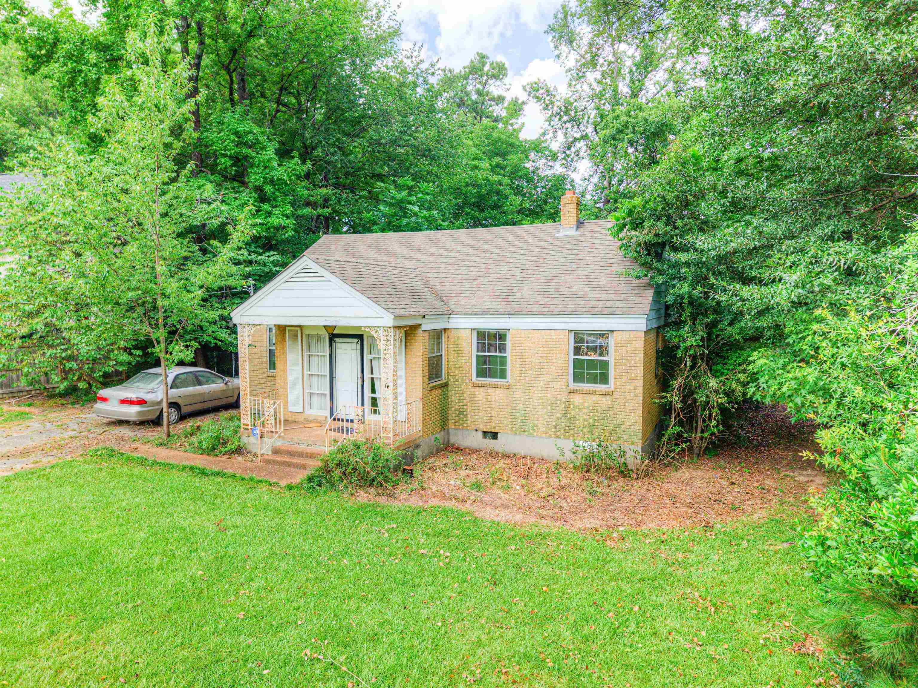 4972 Minden Road Memphis, TN 38117 - Photo 3 of 15 a view of a house with a yard and sitting area