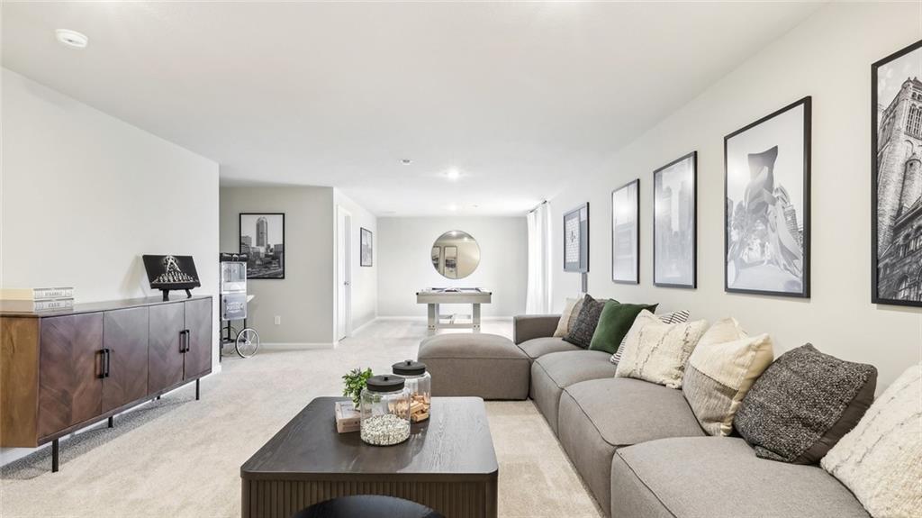 207 Joseph Drive Hunker, PA 15639 - Photo 18 of 25 a living room with furniture and wooden floor