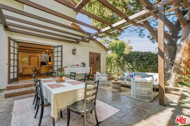 a view of a balcony with chairs