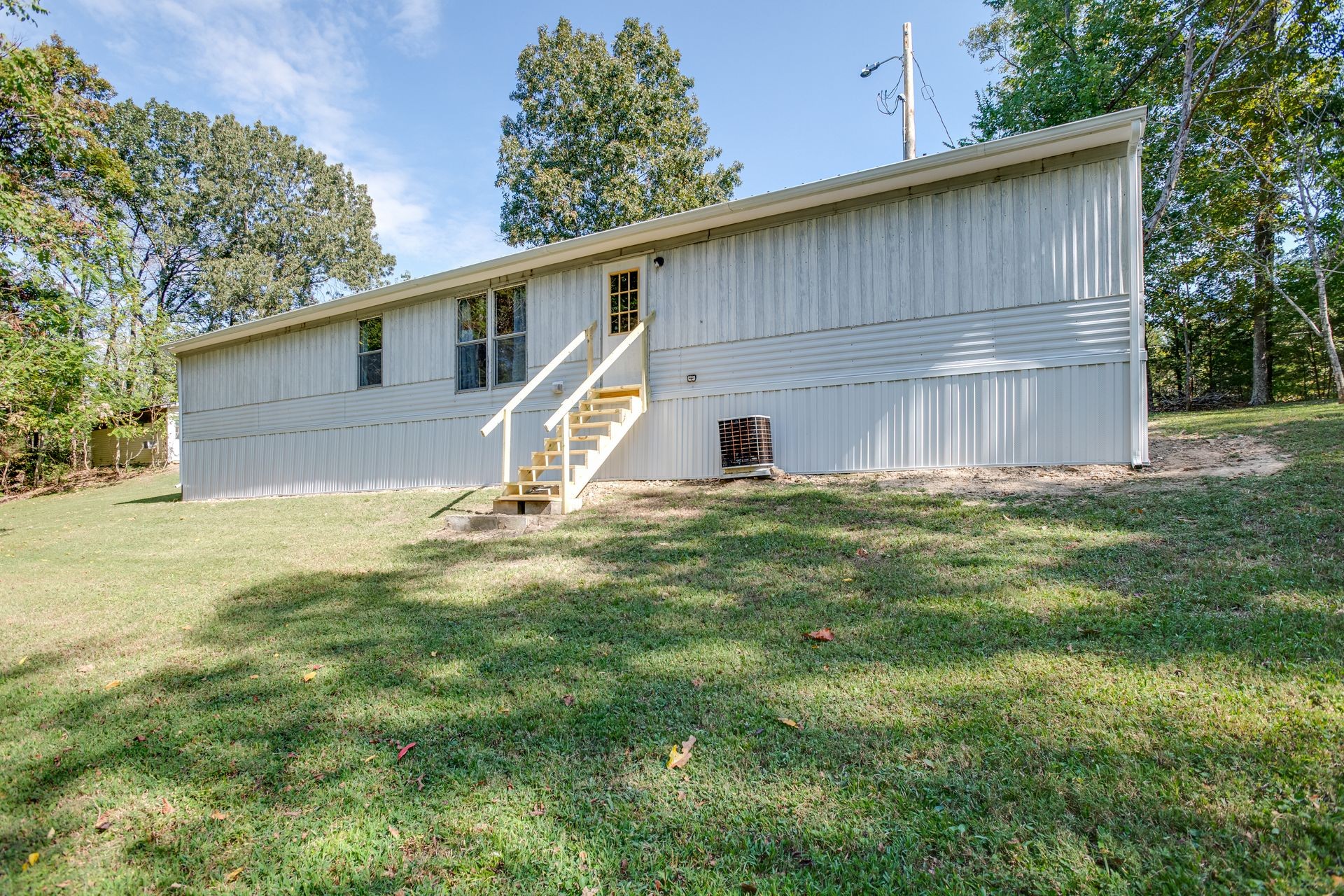 1810 Jim Kim Road Cunningham, TN 37052 - Photo 11 of 37 a view of a back yard of the house