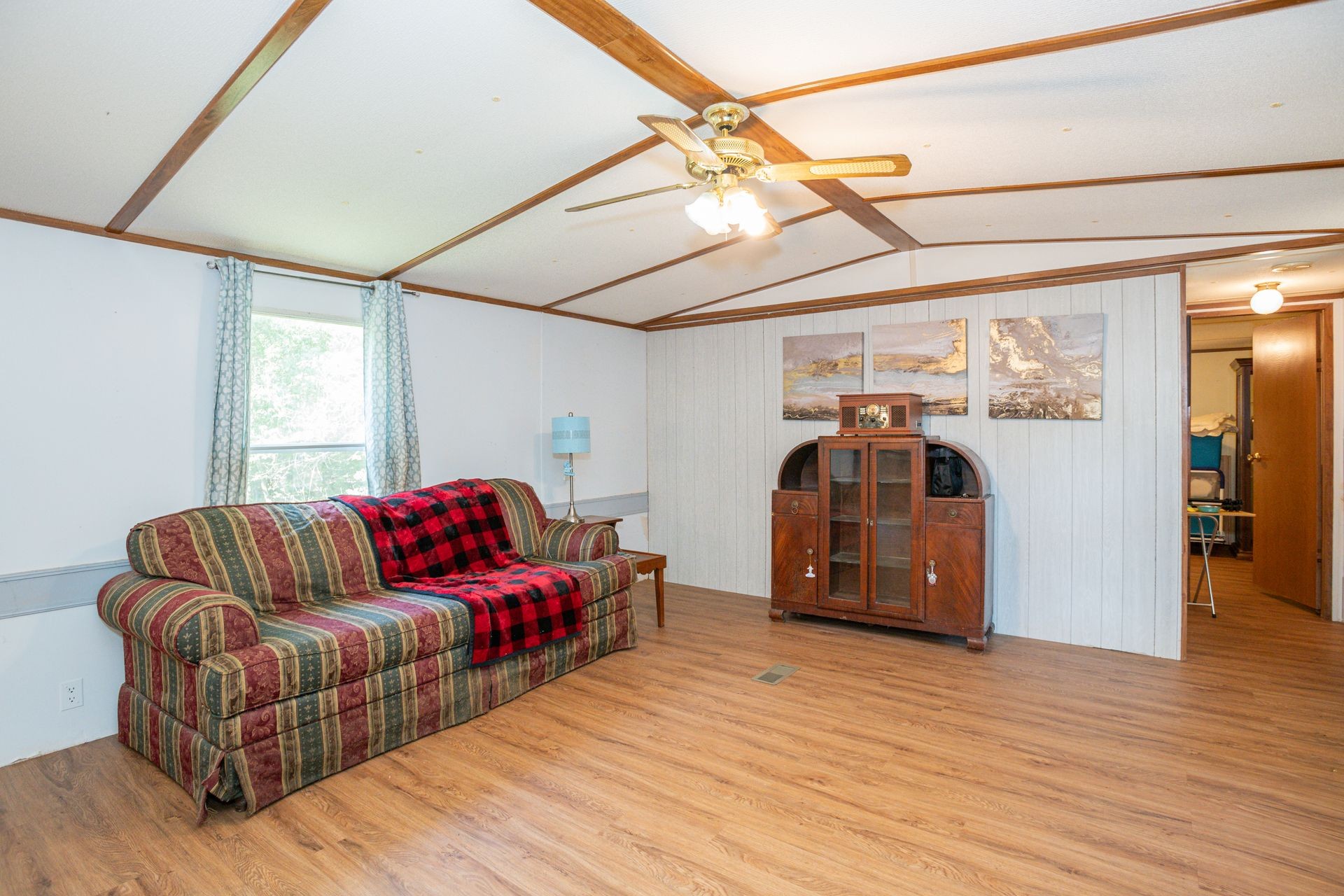 1810 Jim Kim Road Cunningham, TN 37052 - Photo 21 of 37 a living room with furniture and wooden floor