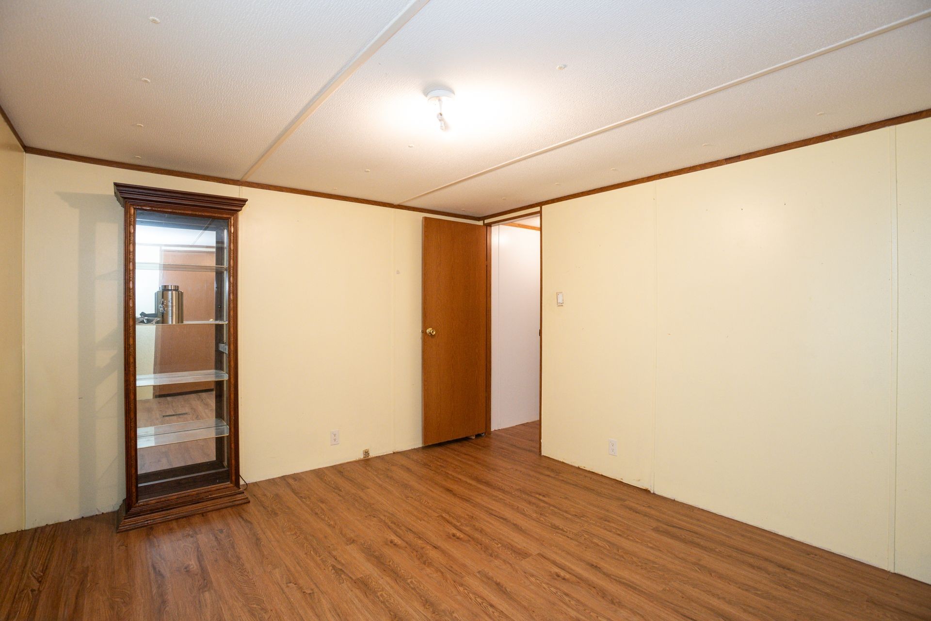 1810 Jim Kim Road Cunningham, TN 37052 - Photo 26 of 37 a view of empty room with wooden floor