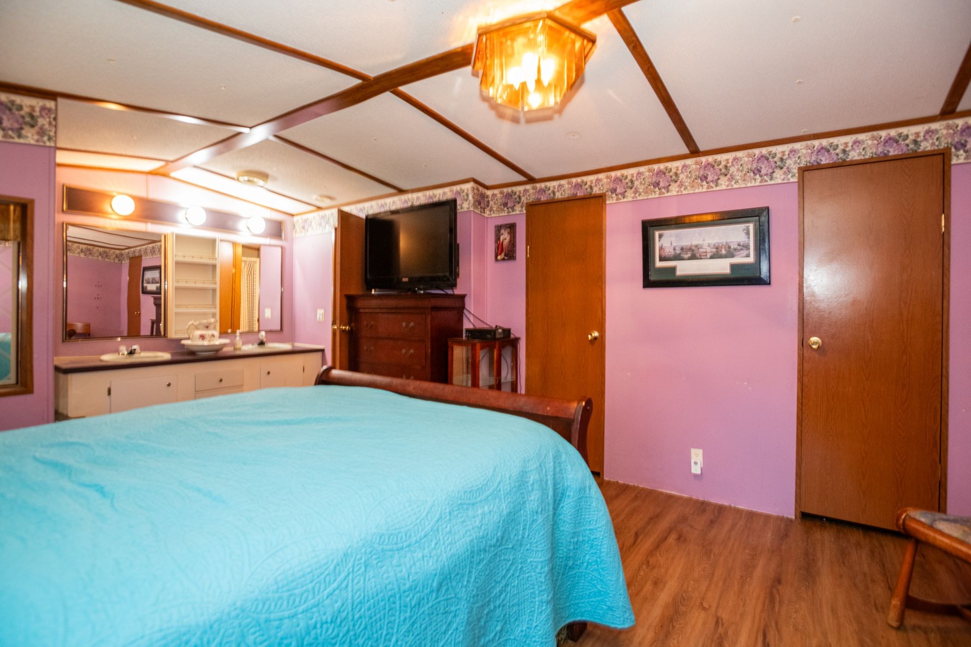 1810 Jim Kim Road Cunningham, TN 37052 - Photo 10 of 37 a bed room with a bed and a television