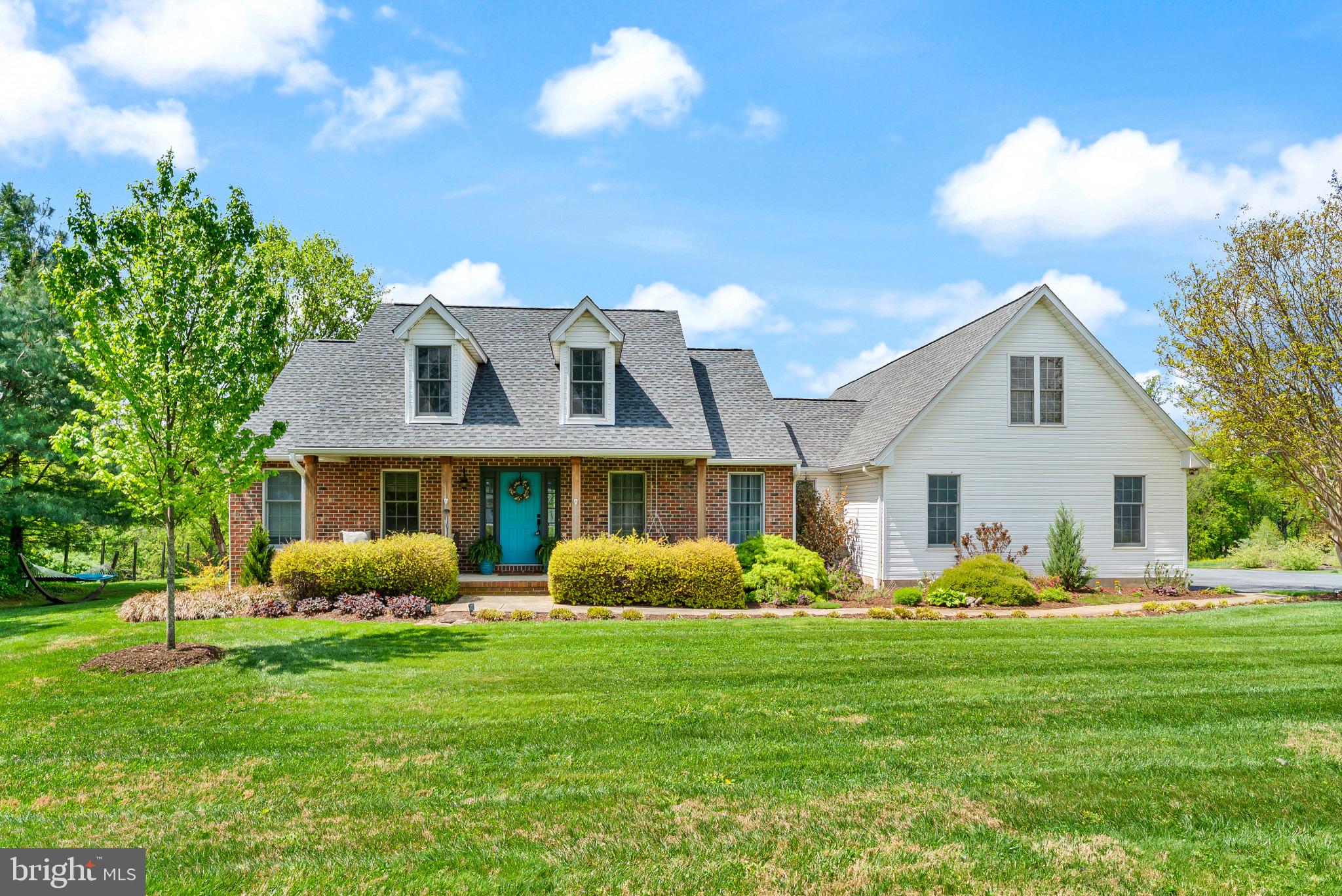 418 North Clear Ridge Road Union Bridge, MD 21791 - Photo 1 of 49 a front view of house with yard and green space