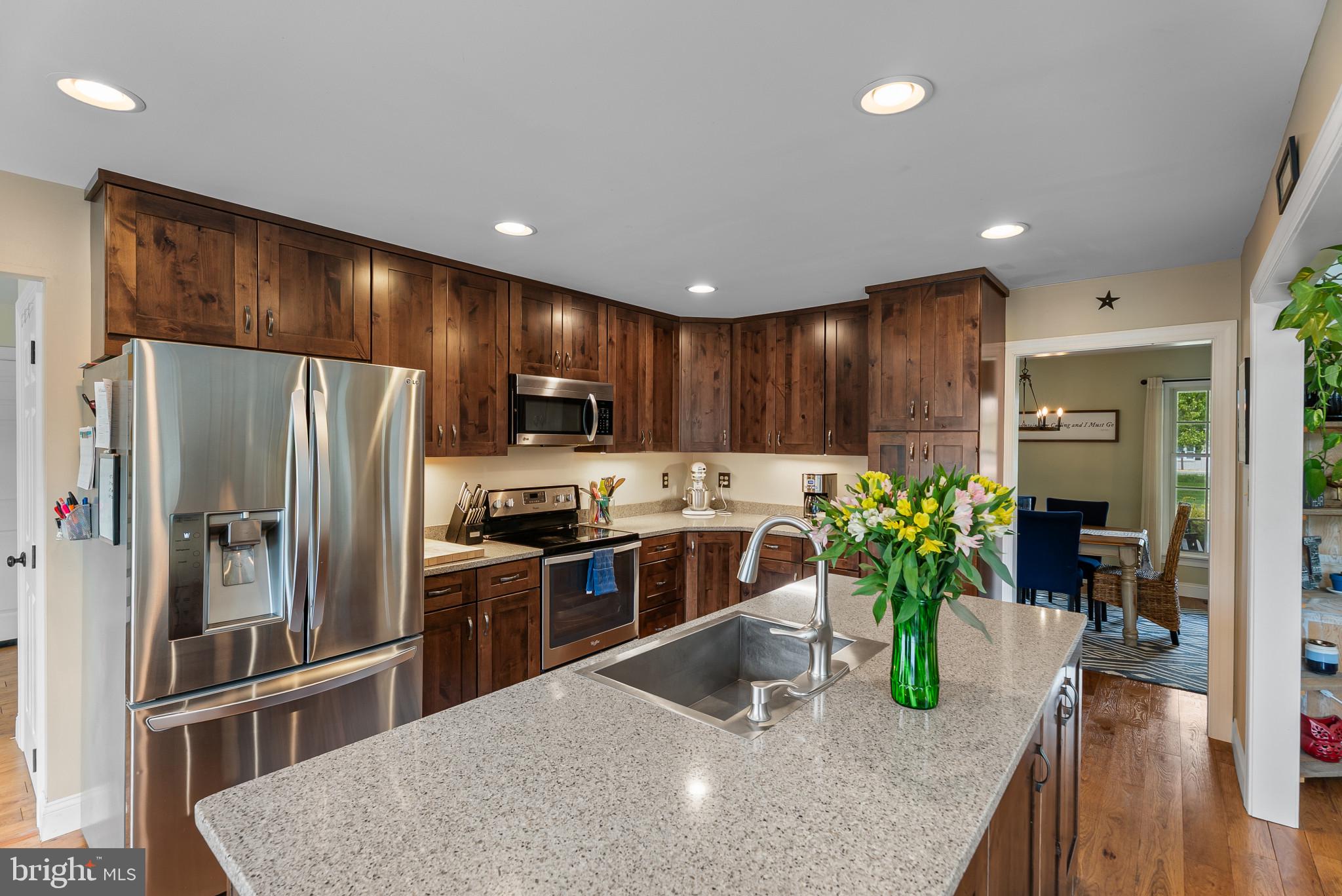 418 North Clear Ridge Road Union Bridge, MD 21791 - Photo 17 of 49 a kitchen with counter top space stainless steel appliances and cabinets