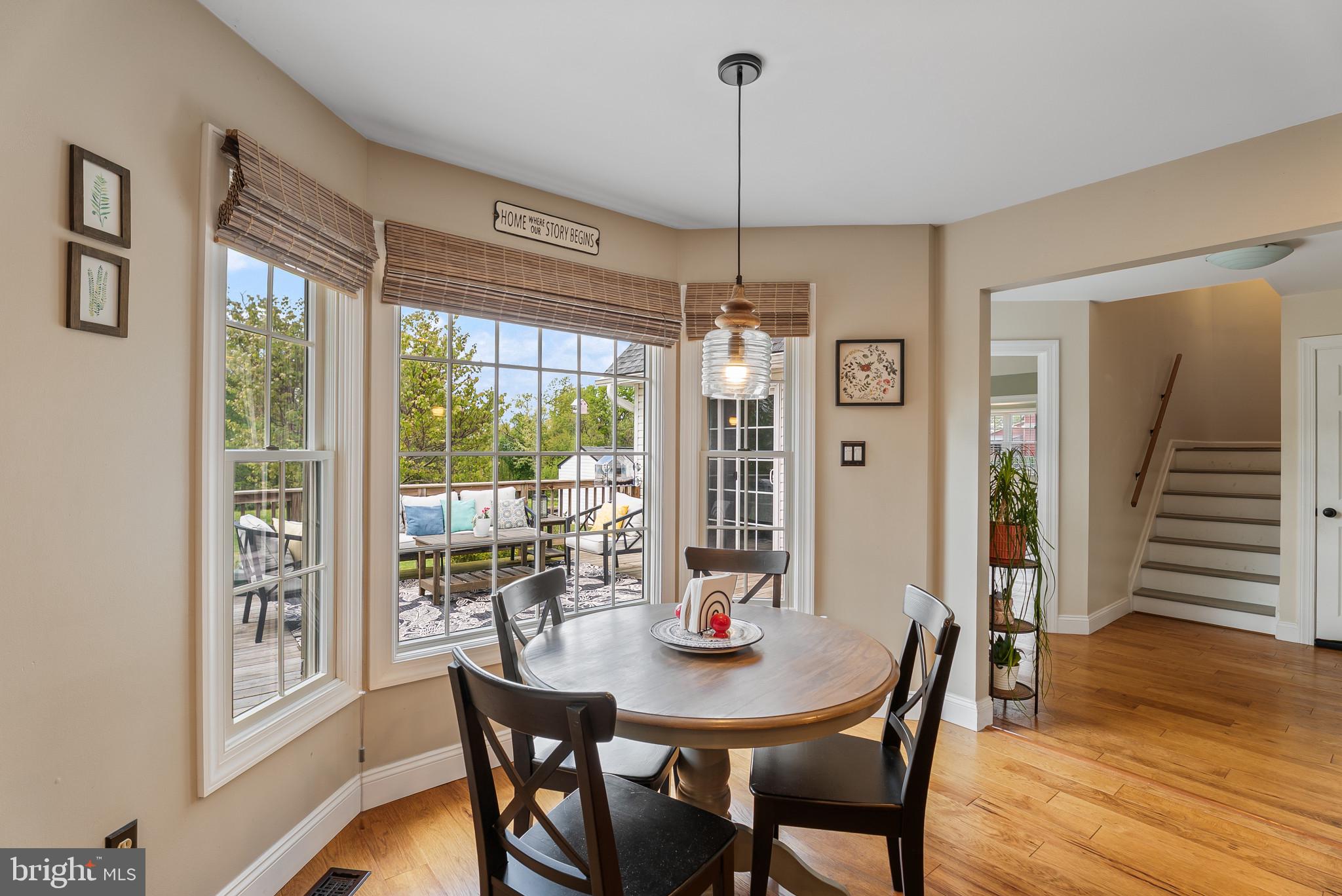 418 North Clear Ridge Road Union Bridge, MD 21791 - Photo 19 of 49 a view of a dining room with furniture window and wooden floor