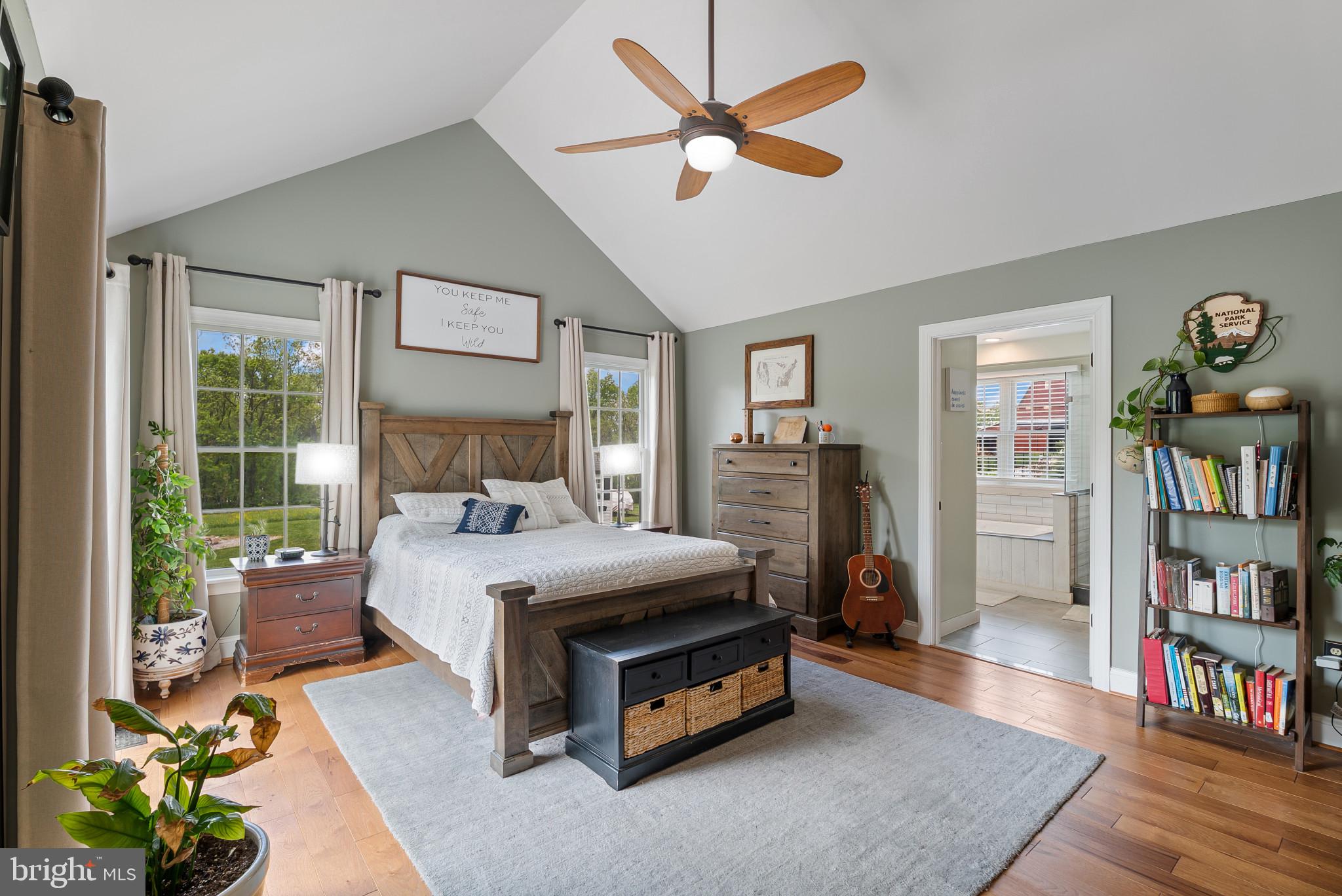 418 North Clear Ridge Road Union Bridge, MD 21791 - Photo 20 of 49 a bedroom with a bed a book shelf and a window