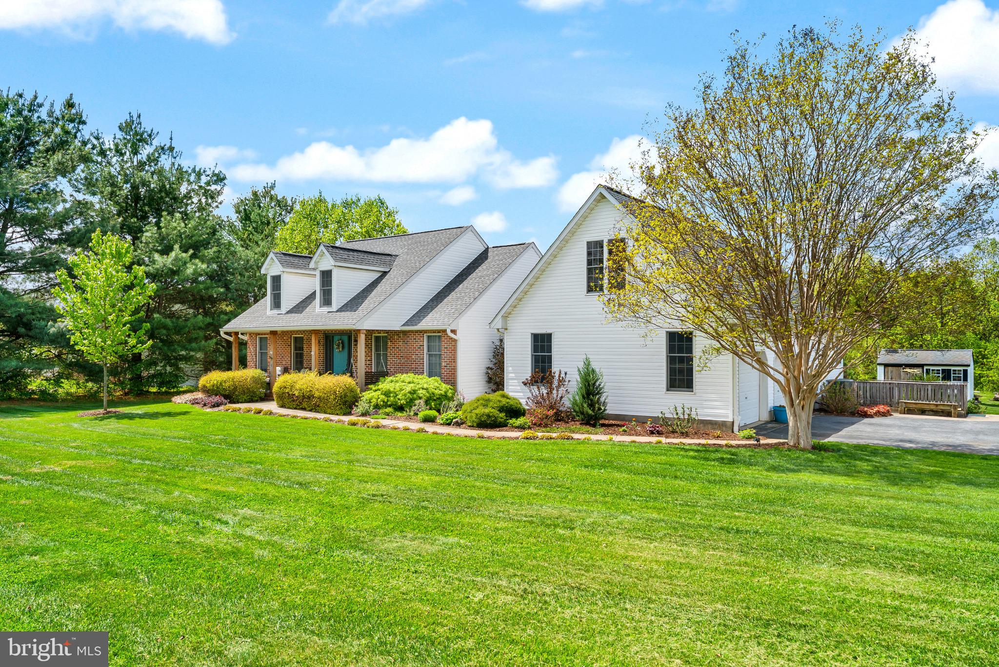 418 North Clear Ridge Road Union Bridge, MD 21791 - Photo 2 of 49 a front view of house with yard and green space