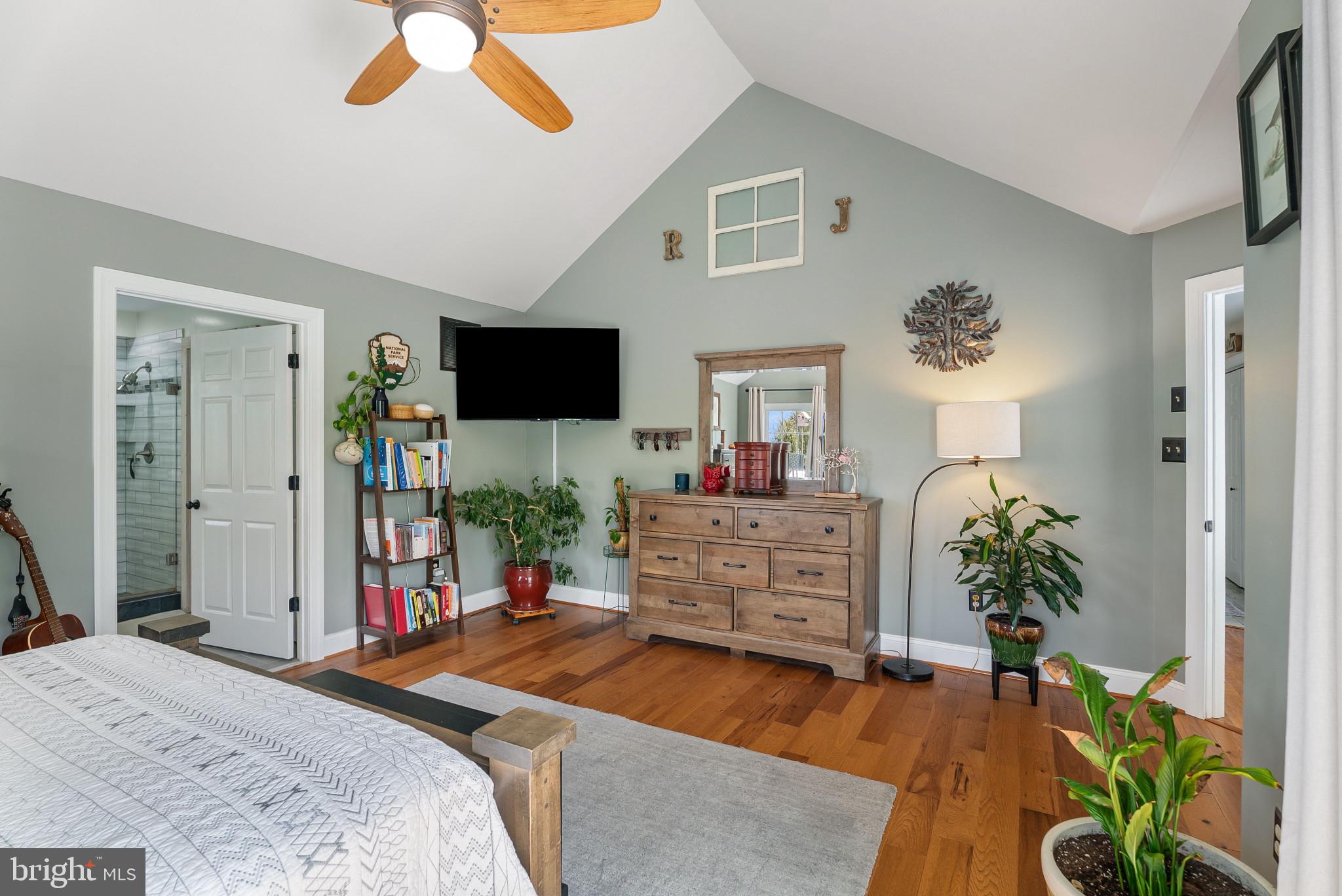 418 North Clear Ridge Road Union Bridge, MD 21791 - Photo 22 of 49 a bed room with furniture and a flat screen tv