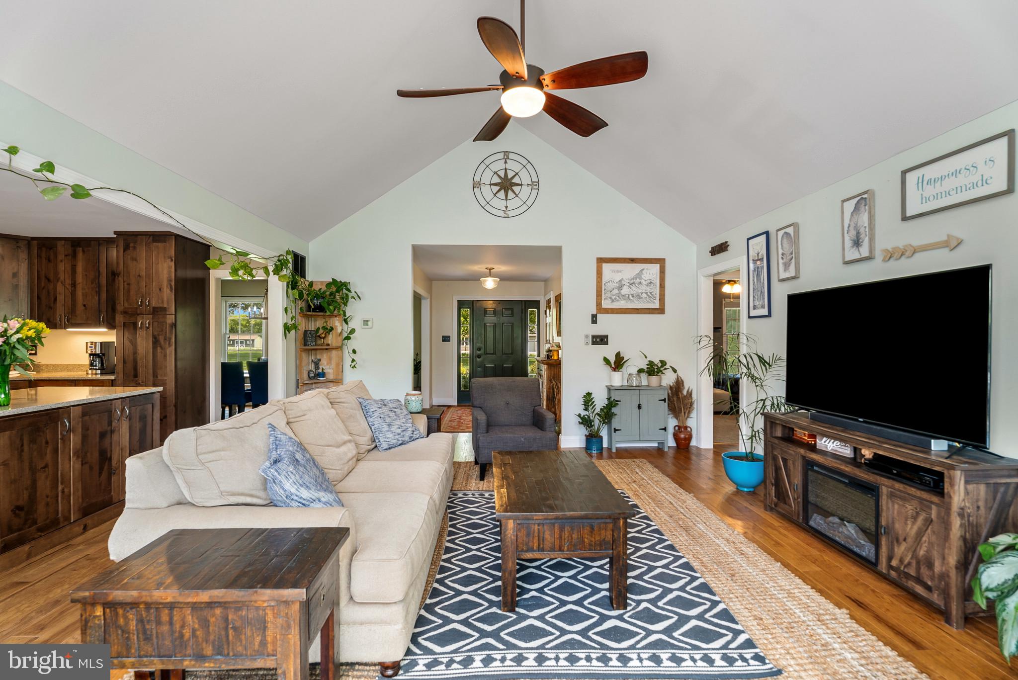 418 North Clear Ridge Road Union Bridge, MD 21791 - Photo 10 of 49 a living room with furniture and a flat screen tv