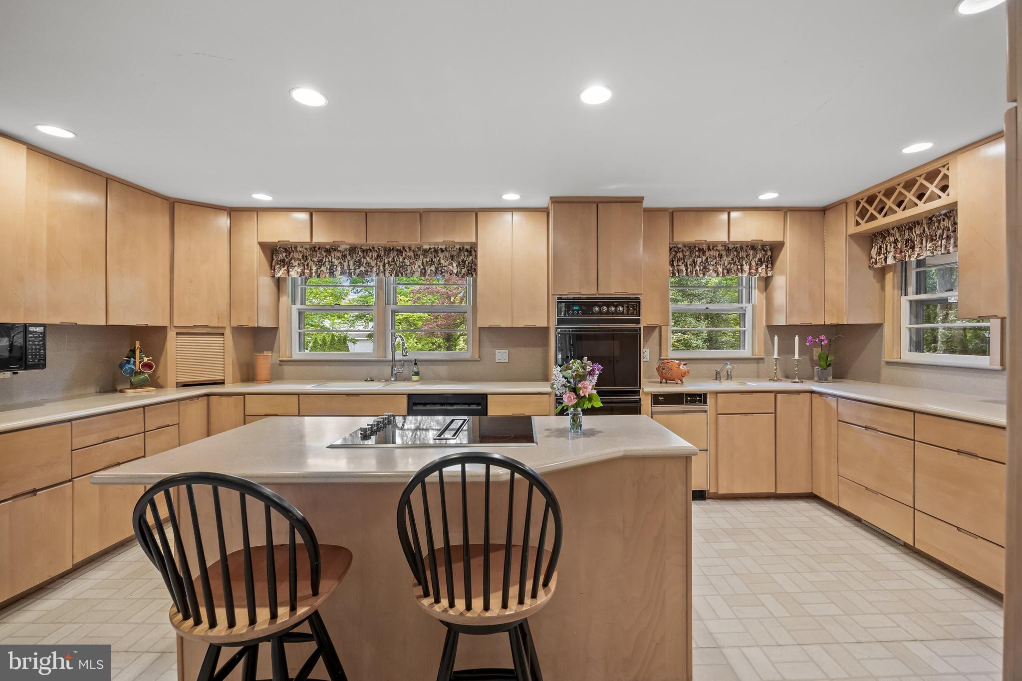 614 Chestnut Street Moorestown, NJ 08057 - Photo 19 of 86 a kitchen with a table chairs sink and microwave