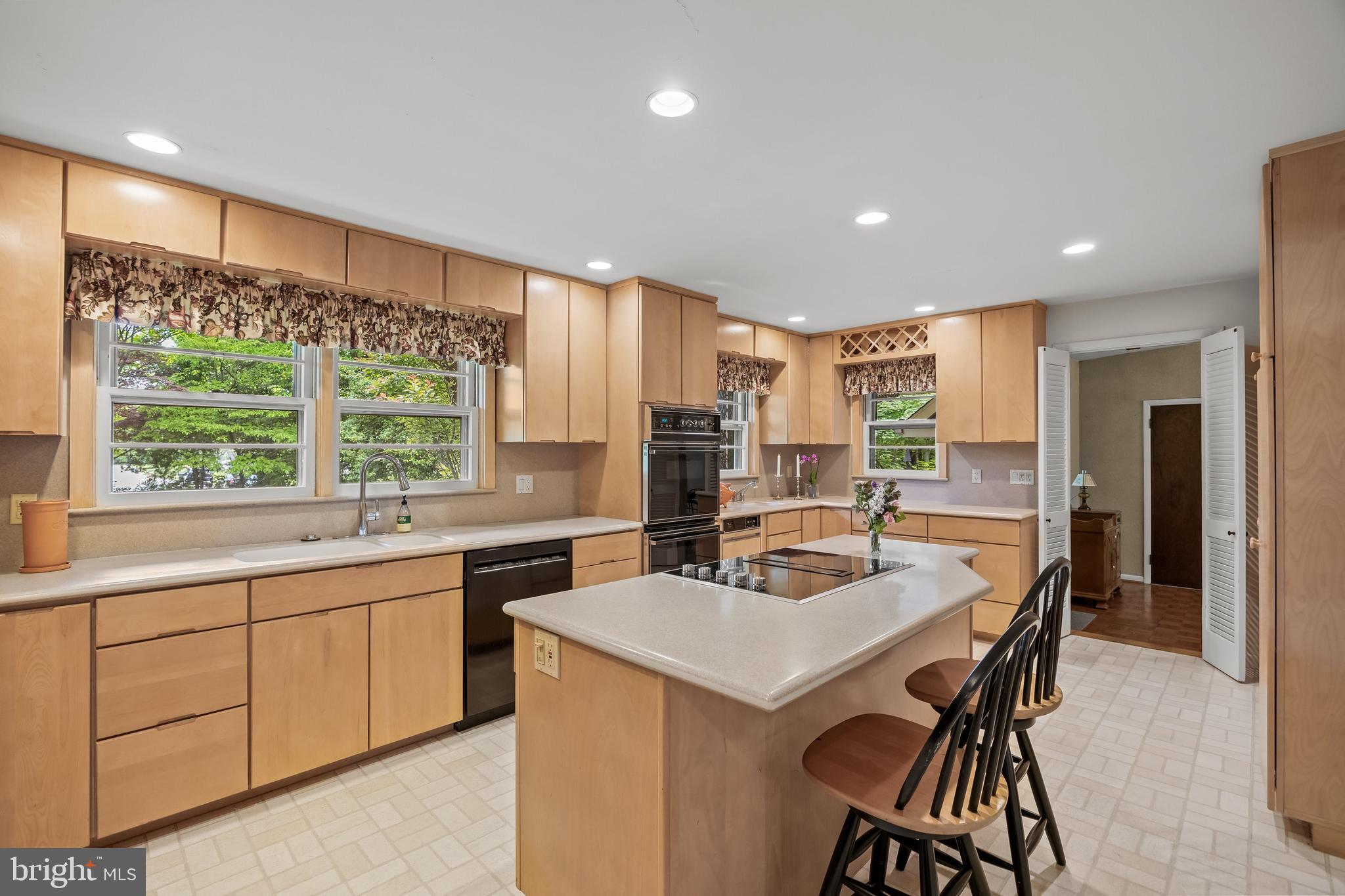 614 Chestnut Street Moorestown, NJ 08057 - Photo 20 of 86 a kitchen with a sink a stove a refrigerator and cabinets