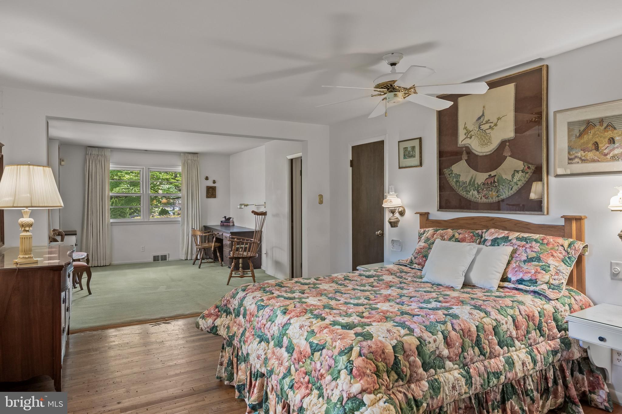 614 Chestnut Street Moorestown, NJ 08057 - Photo 35 of 86 a bedroom with a bed and a chandelier