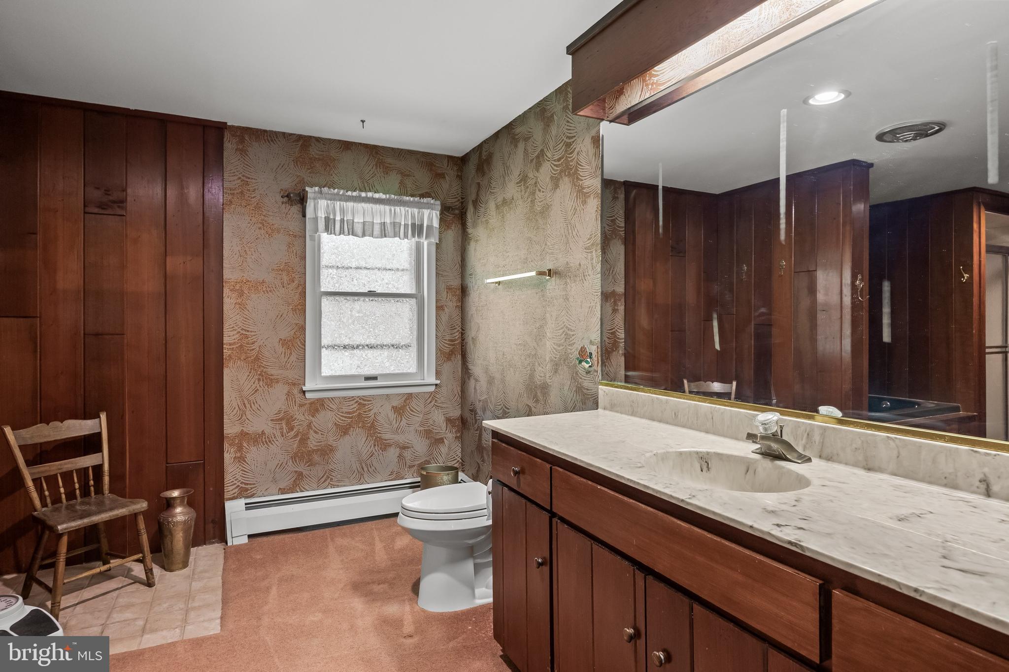 614 Chestnut Street Moorestown, NJ 08057 - Photo 39 of 86 a bathroom with a granite countertop sink toilet and shower