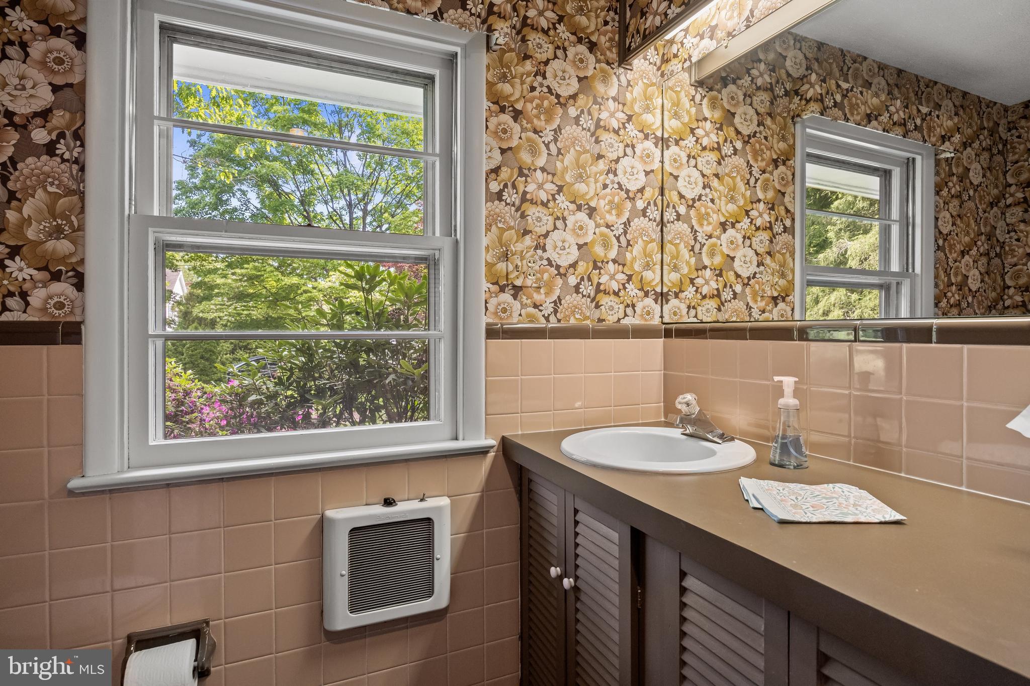 614 Chestnut Street Moorestown, NJ 08057 - Photo 43 of 86 a bathroom with a sink vanity and a mirror