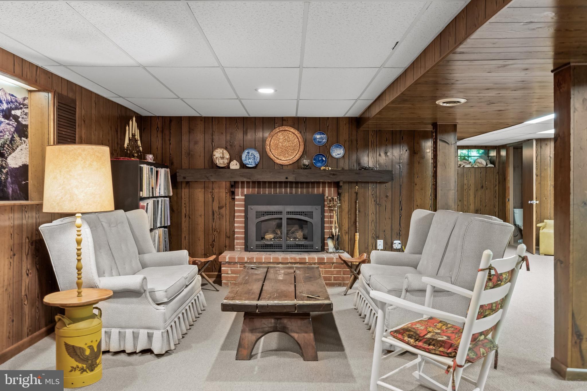 614 Chestnut Street Moorestown, NJ 08057 - Photo 60 of 86 a living room with furniture and a fireplace