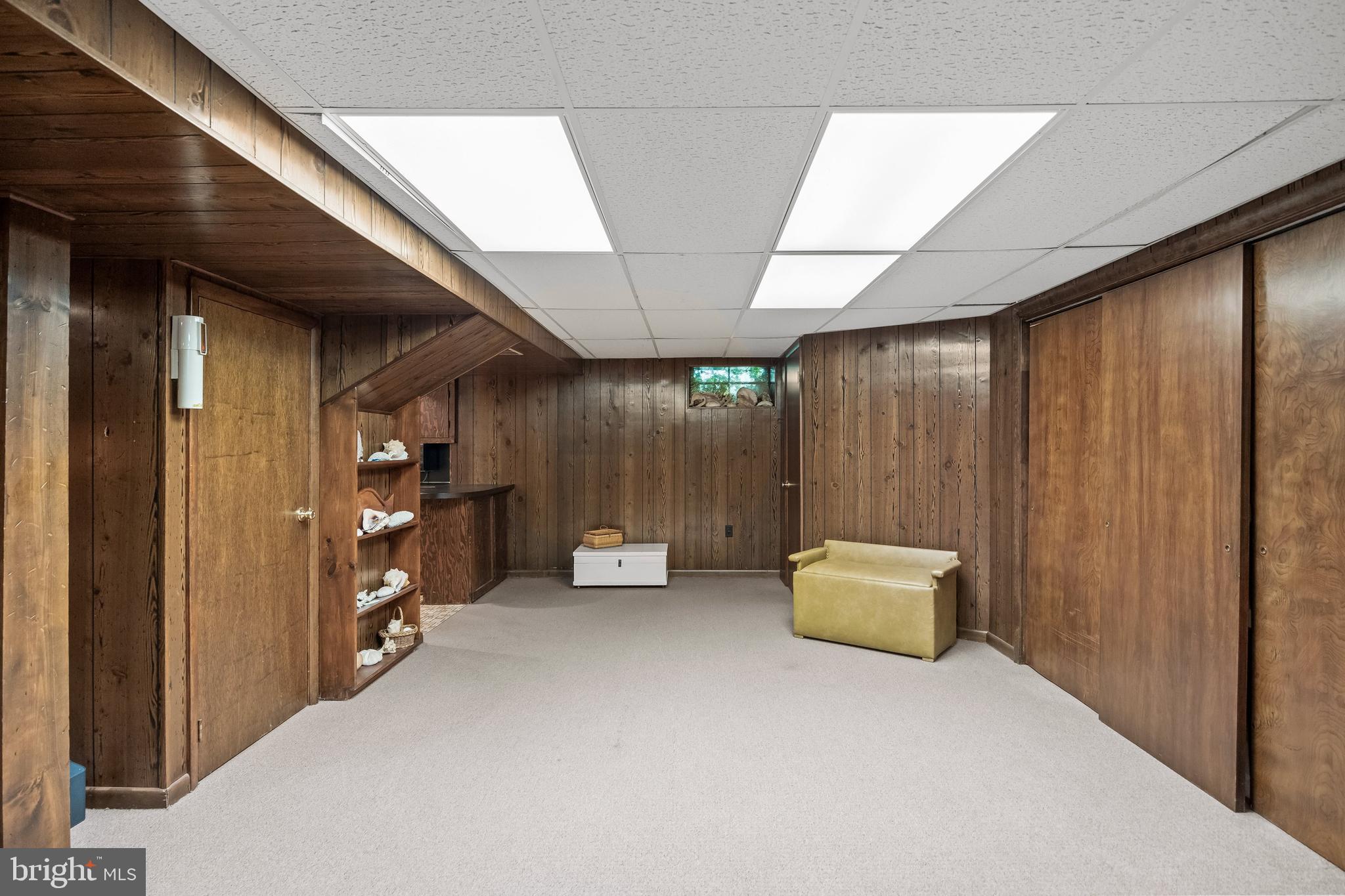 614 Chestnut Street Moorestown, NJ 08057 - Photo 62 of 86 a hallway with couch and a large window