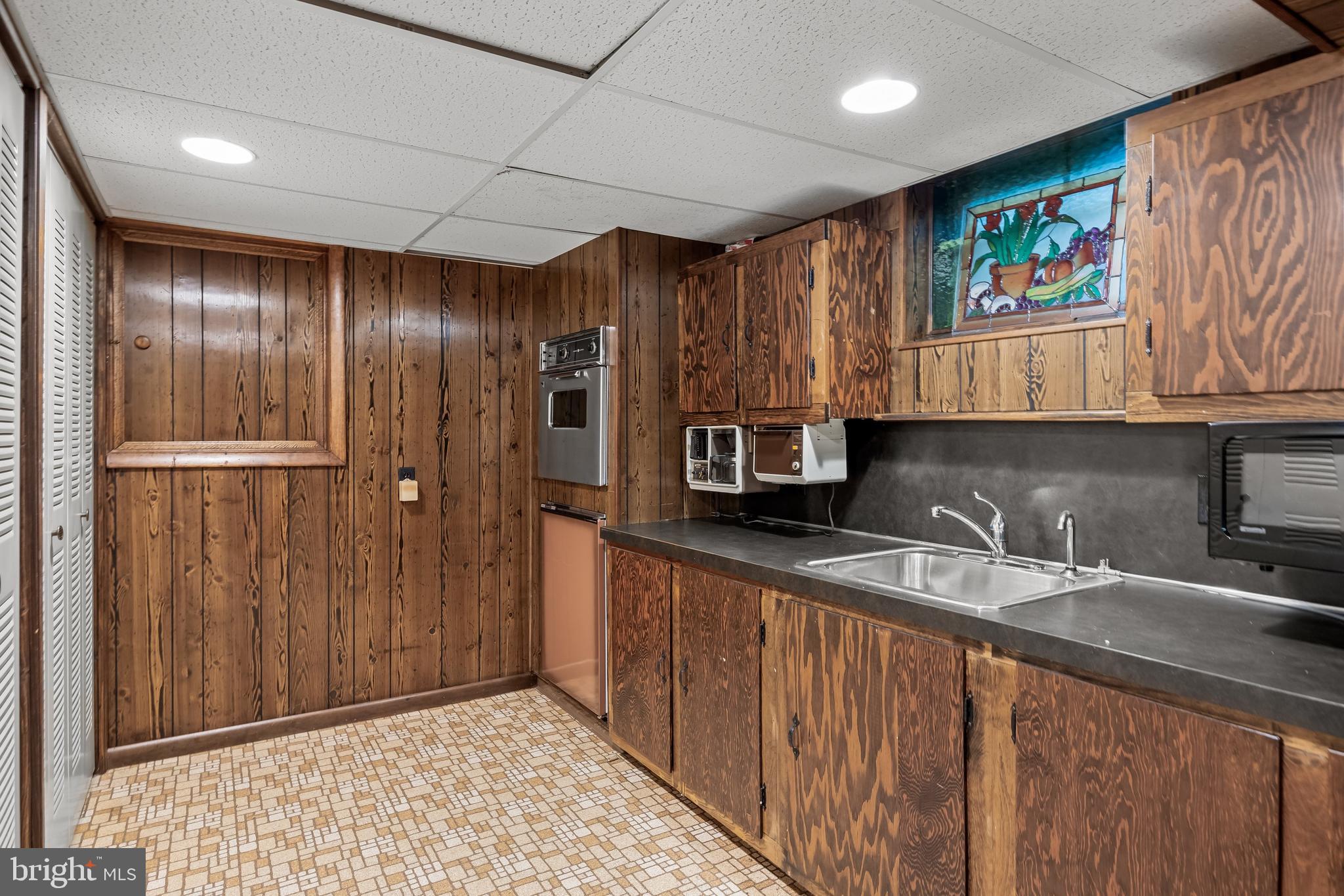 614 Chestnut Street Moorestown, NJ 08057 - Photo 64 of 86 a kitchen with stainless steel appliances granite countertop a refrigerator and a sink