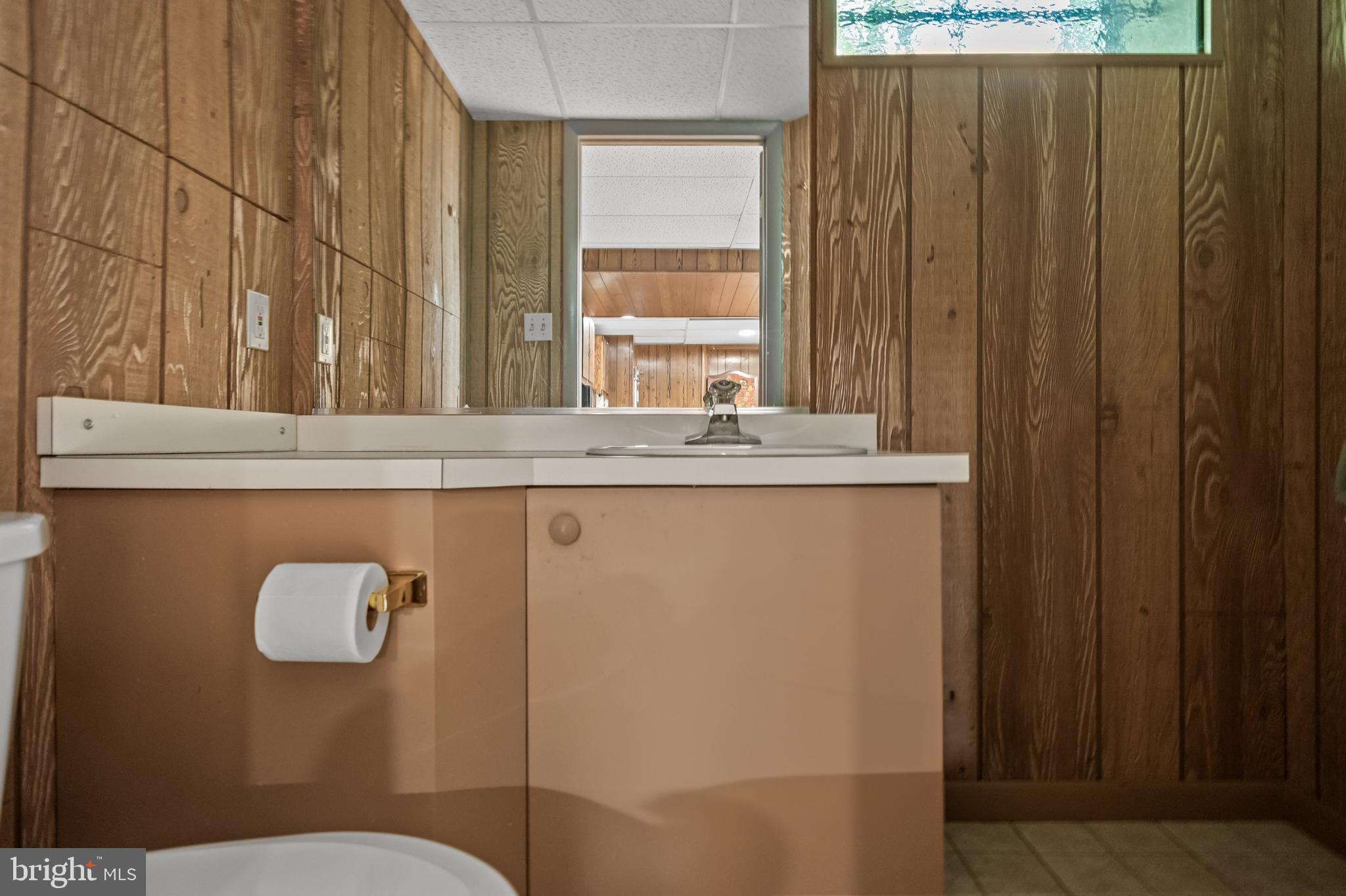614 Chestnut Street Moorestown, NJ 08057 - Photo 65 of 86 a bathroom with a granite countertop sink and a toilet