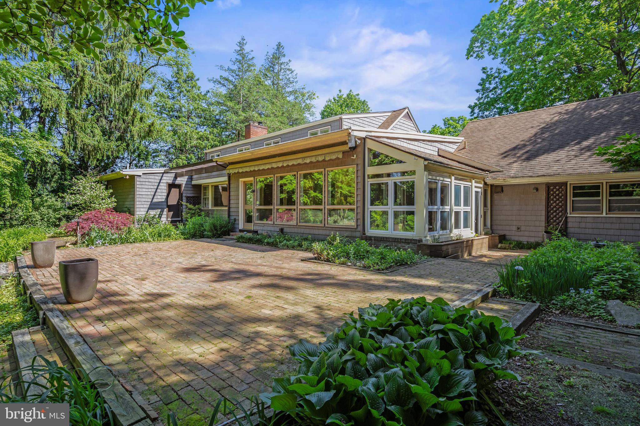 614 Chestnut Street Moorestown, NJ 08057 - Photo 67 of 86 a front view of a house with a garden