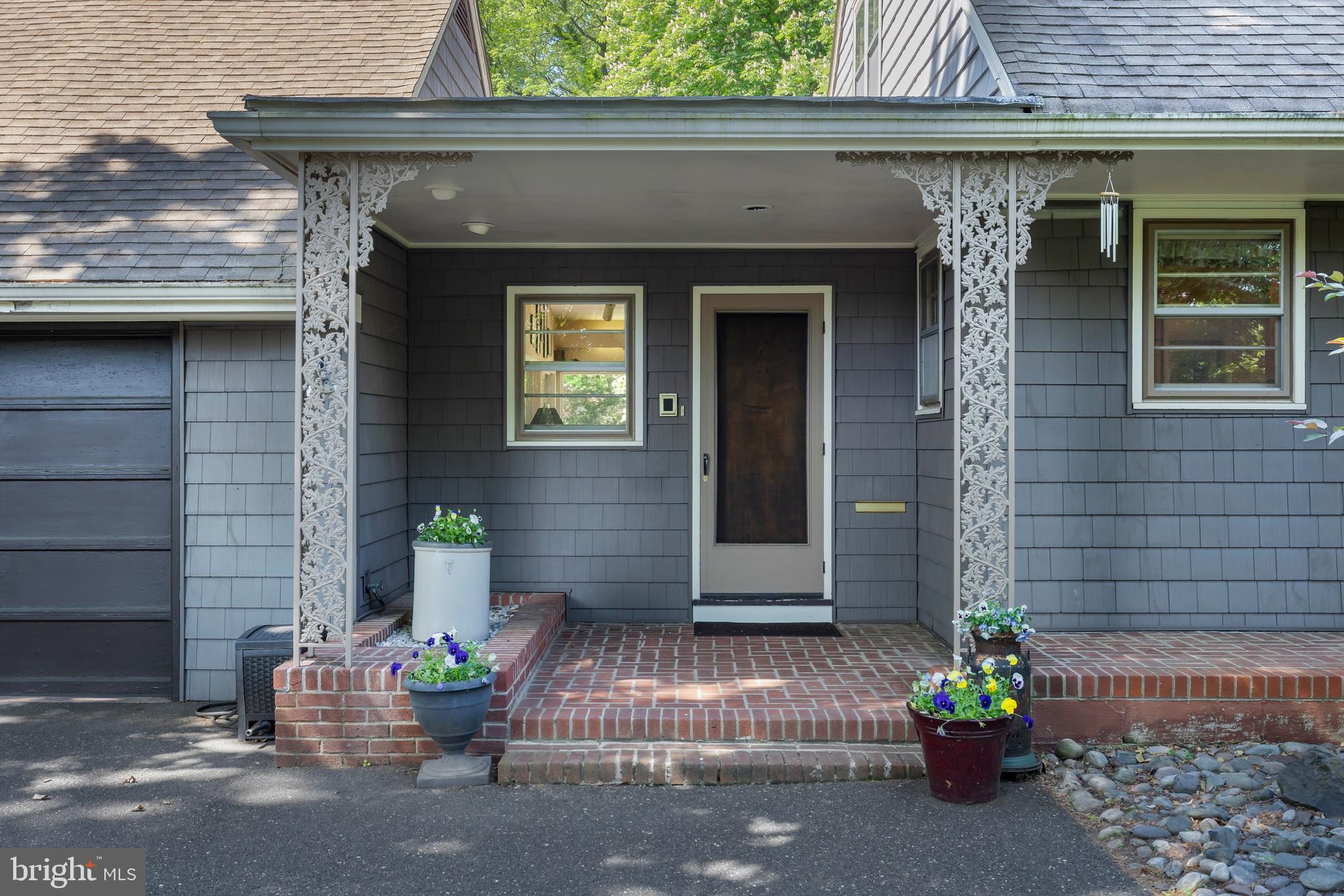 614 Chestnut Street Moorestown, NJ 08057 - Photo 7 of 86 a front view of a house with a yard