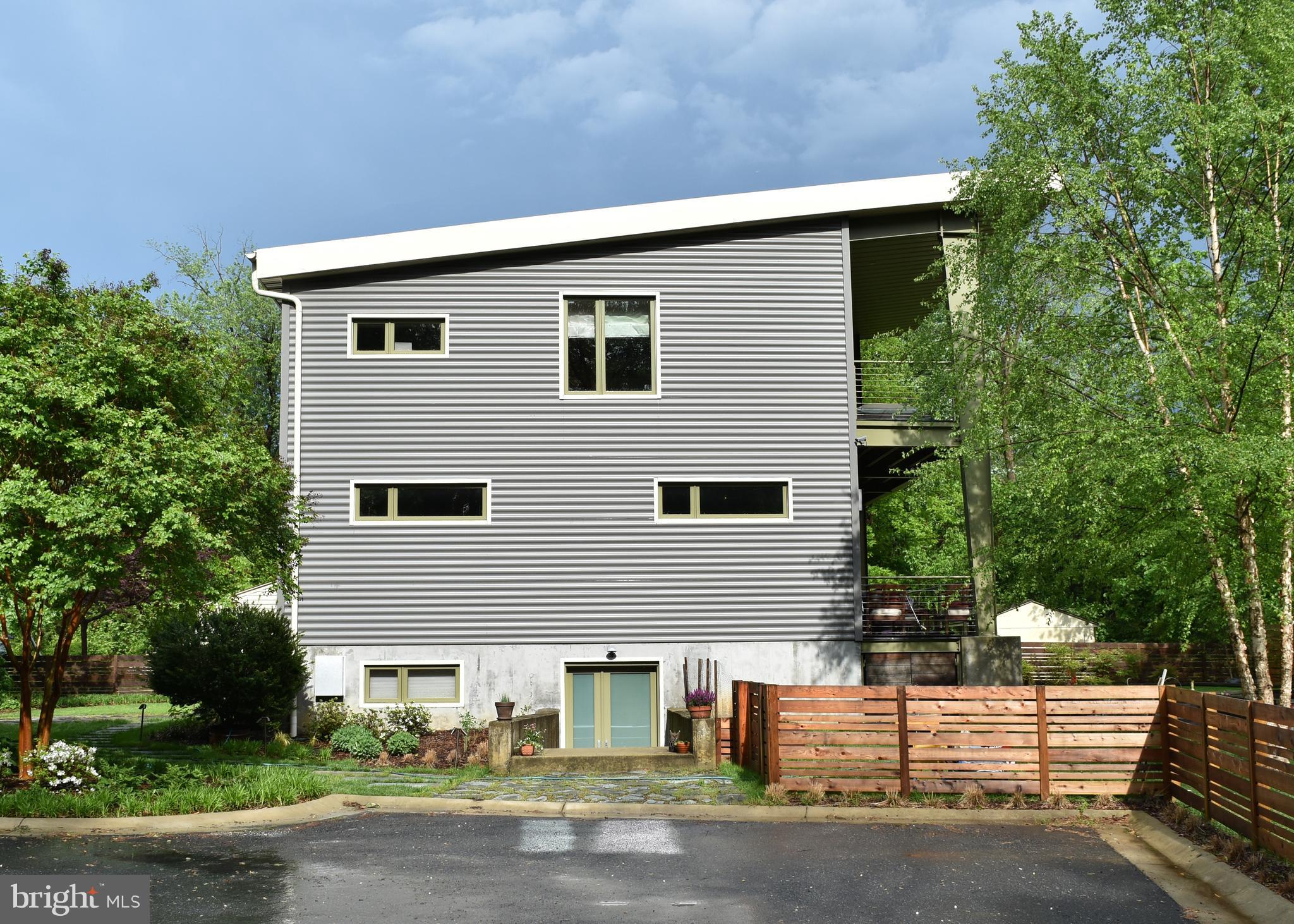 6 Thorne Road Cabin John, MD 20818 - Photo 2 of 39 Side elevation showing fenced back yard