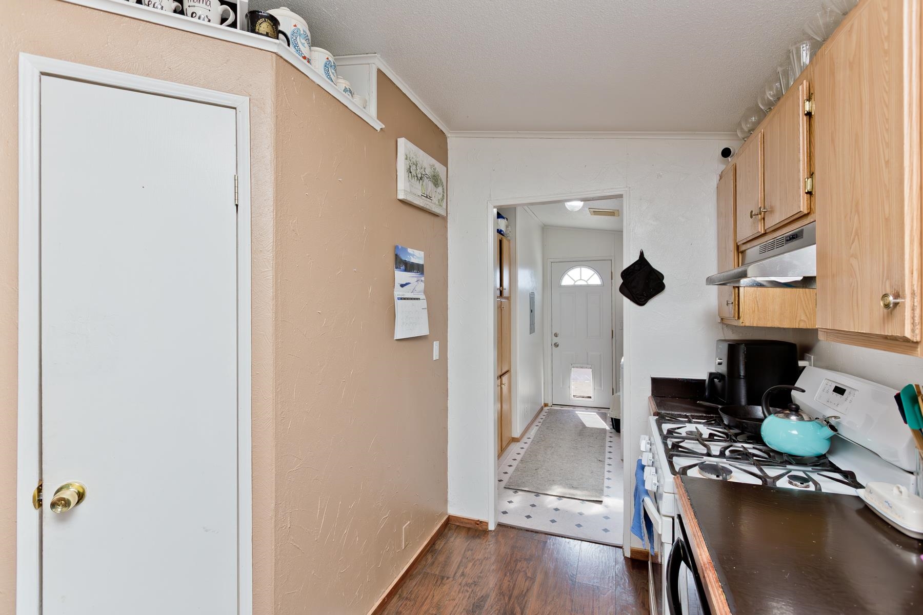 443 Florence Road Grand Junction, CO 81504 - Photo 15 of 40 a view of a hallway with a dining table & chairs