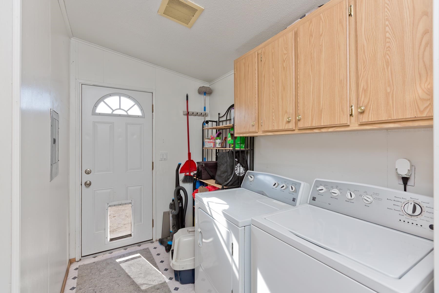 443 Florence Road Grand Junction, CO 81504 - Photo 16 of 40 a view of storage and utility room with washer and dryer