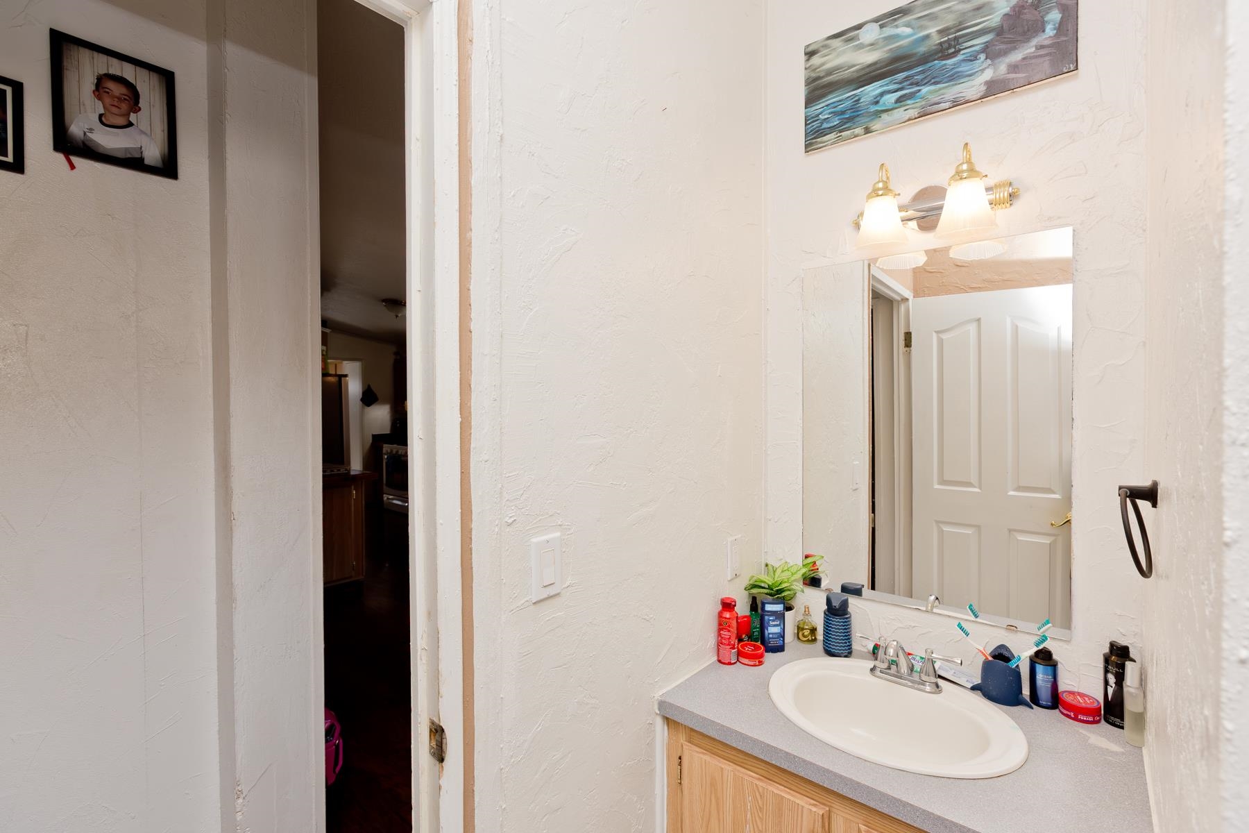 443 Florence Road Grand Junction, CO 81504 - Photo 28 of 40 a bathroom with a sink and a mirror
