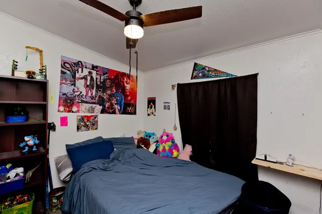 a bed room with furniture and a closet