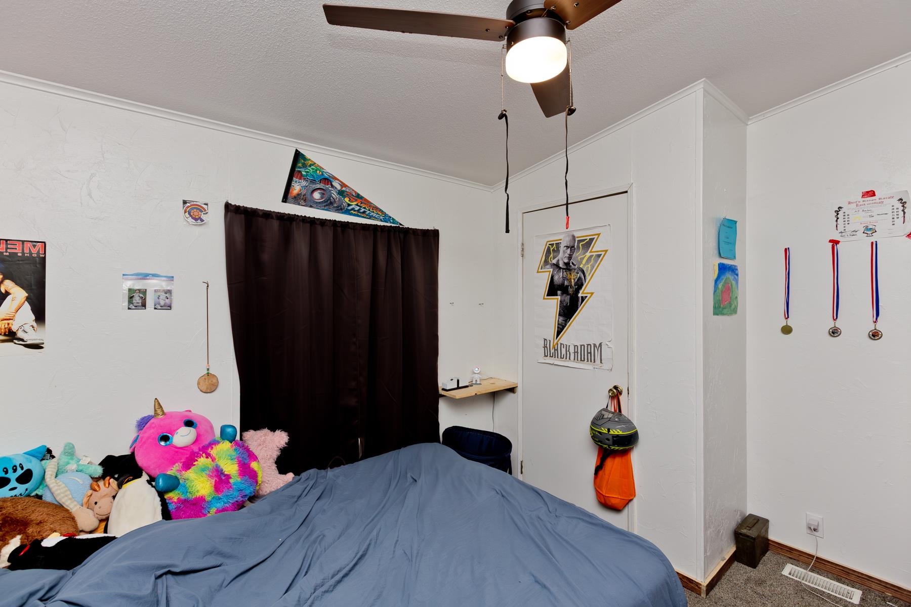 443 Florence Road Grand Junction, CO 81504 - Photo 31 of 40 a bedroom with furniture and wooden floor