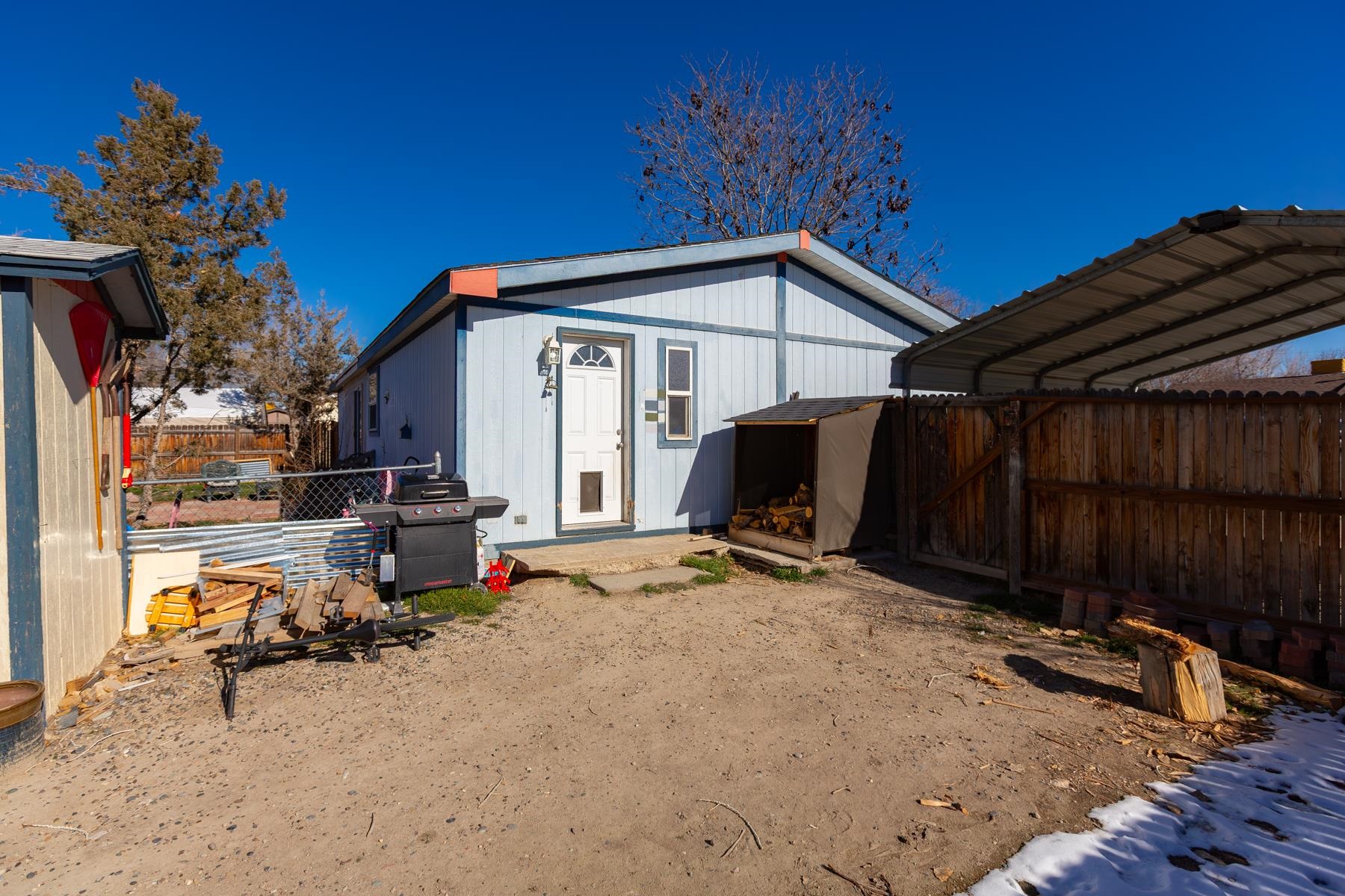 443 Florence Road Grand Junction, CO 81504 - Photo 38 of 40 a view of a house with backyard and sitting area