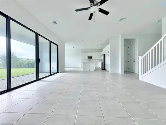 a bathroom with a toilet a sink and shower
