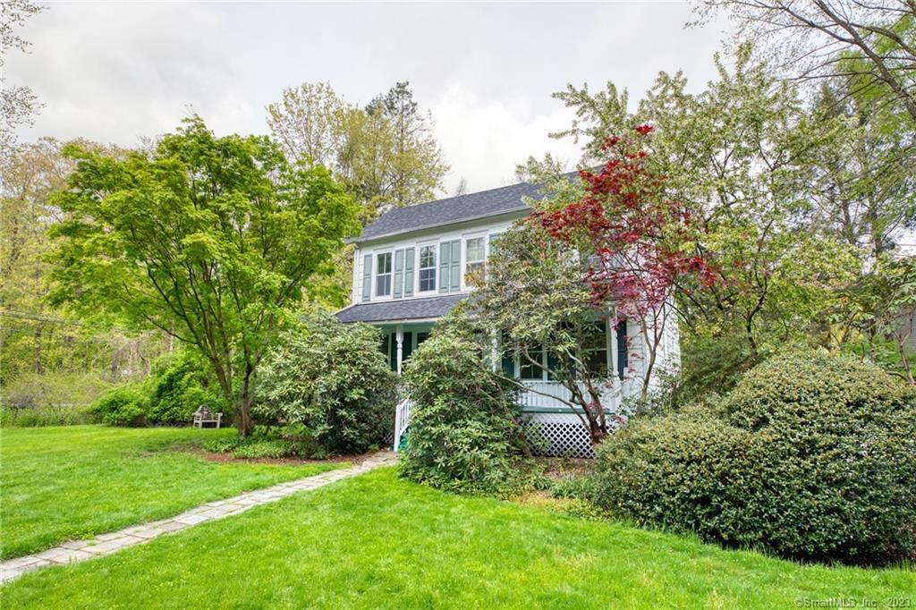 12 North Stamford Road Stamford, CT 06903 - Photo 1 of 1 a view of a house with a backyard