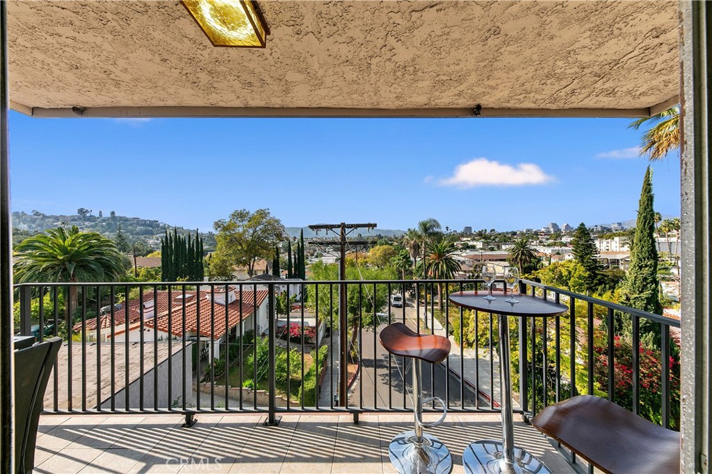 1517 East Garfield Avenue, Unit 53 Glendale, CA 91205 - Photo 14 of 53 a view of a balcony with wooden floor and city view