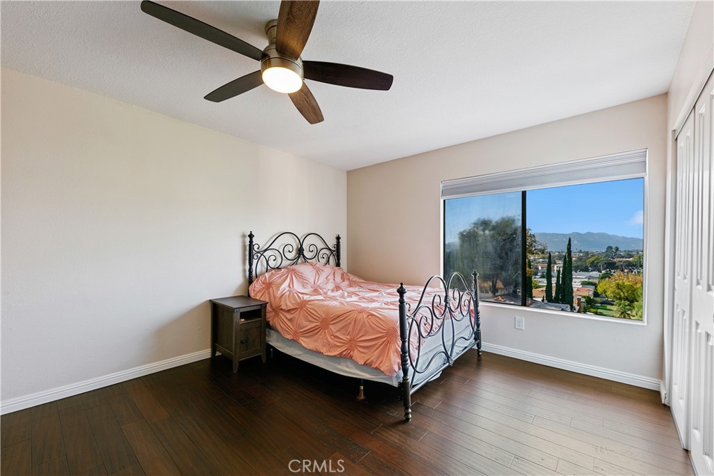 1517 East Garfield Avenue, Unit 53 Glendale, CA 91205 - Photo 19 of 53 a bedroom with a bed and a window